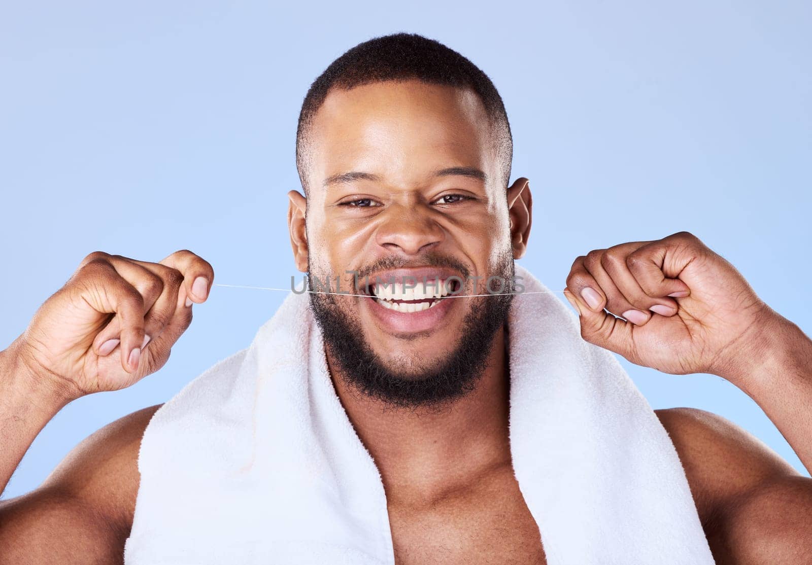 Portrait, man and floss teeth for smile, dental health and care for gum gingivitis in studio. Face of happy black male model, oral thread and cleaning mouth for fresh breath, tooth hygiene and beauty.