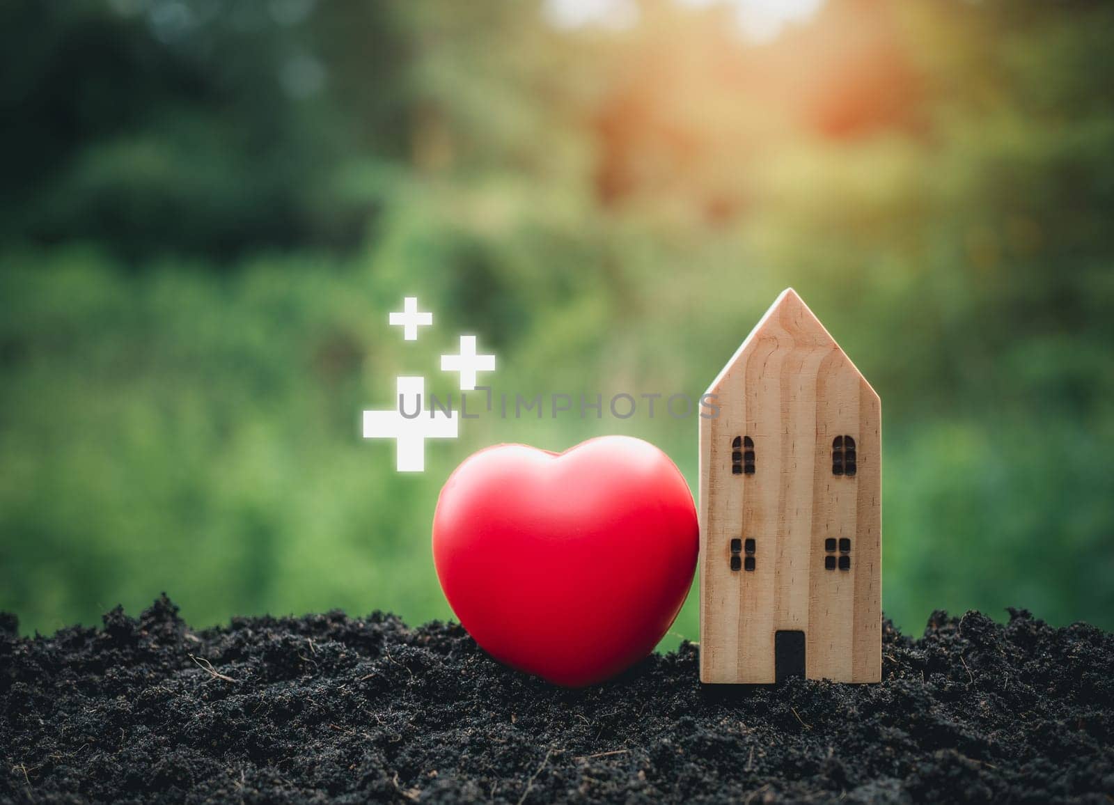 The concept of health insurance and medical welfare. Model wooden house and red heart with plus icon. Health insurance and access to health care. health care planning by Unimages2527