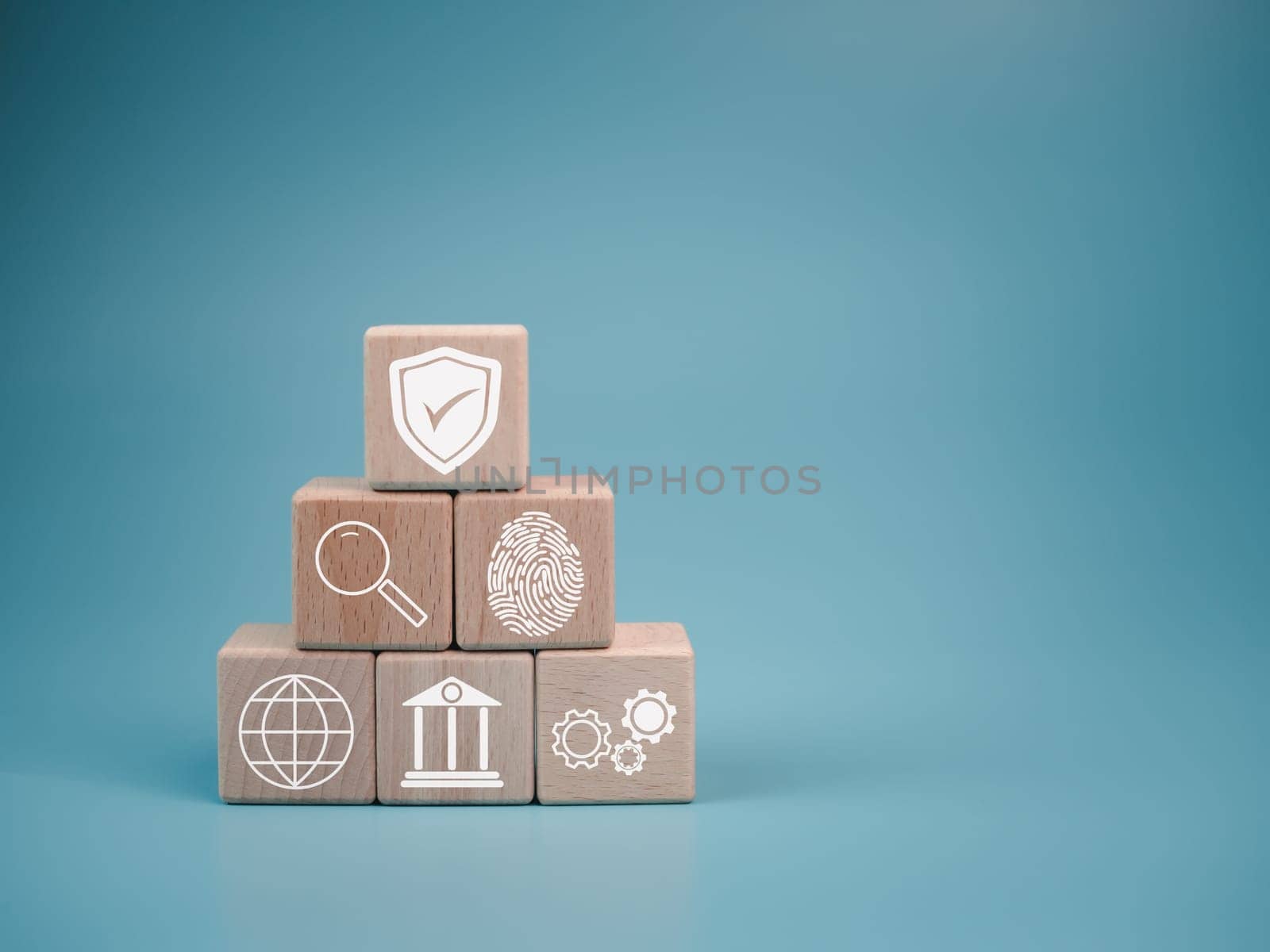 icon on a wooden cube Represents data theft protection Security in business teams by Unimages2527