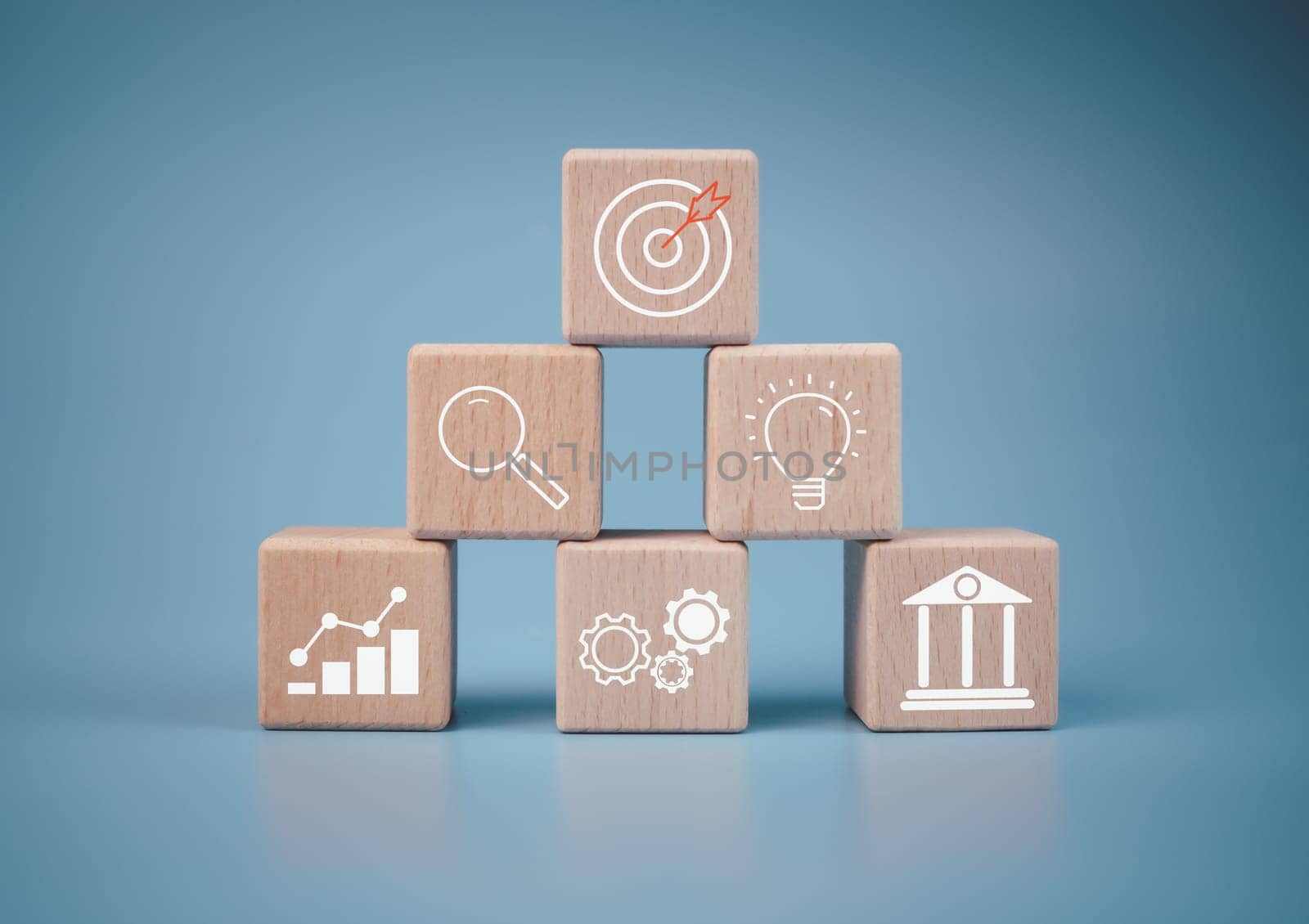 Wood cube block stacking with icon.Concept of business strategy and goal action plan. 