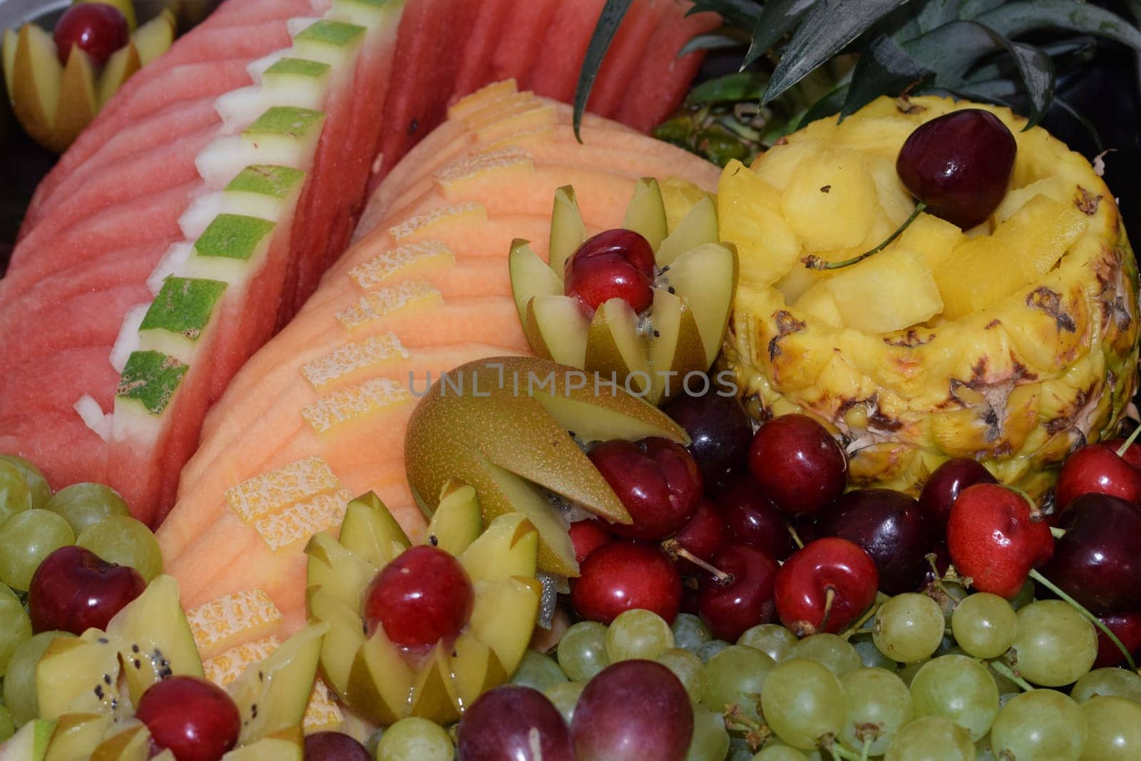 fresh summer fruits sliced ​​beautifully