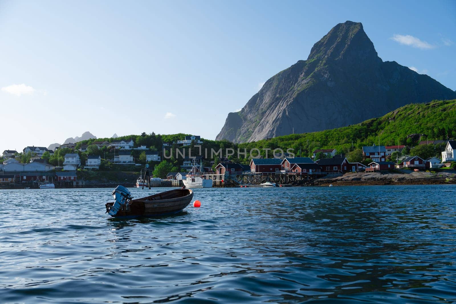 View on the small harbor of fishing village, Summer Lofoten islands, Norway. by PhotoTime