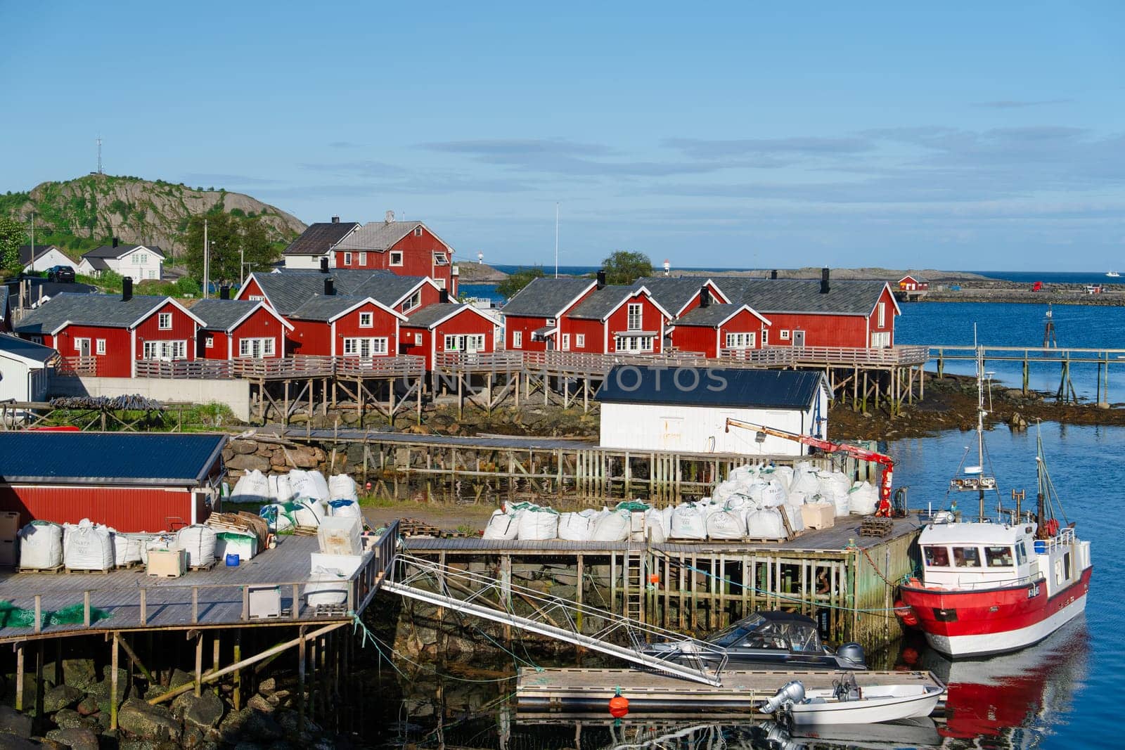 View on the small harbor of fishing village, Summer Lofoten islands, Norway. by PhotoTime