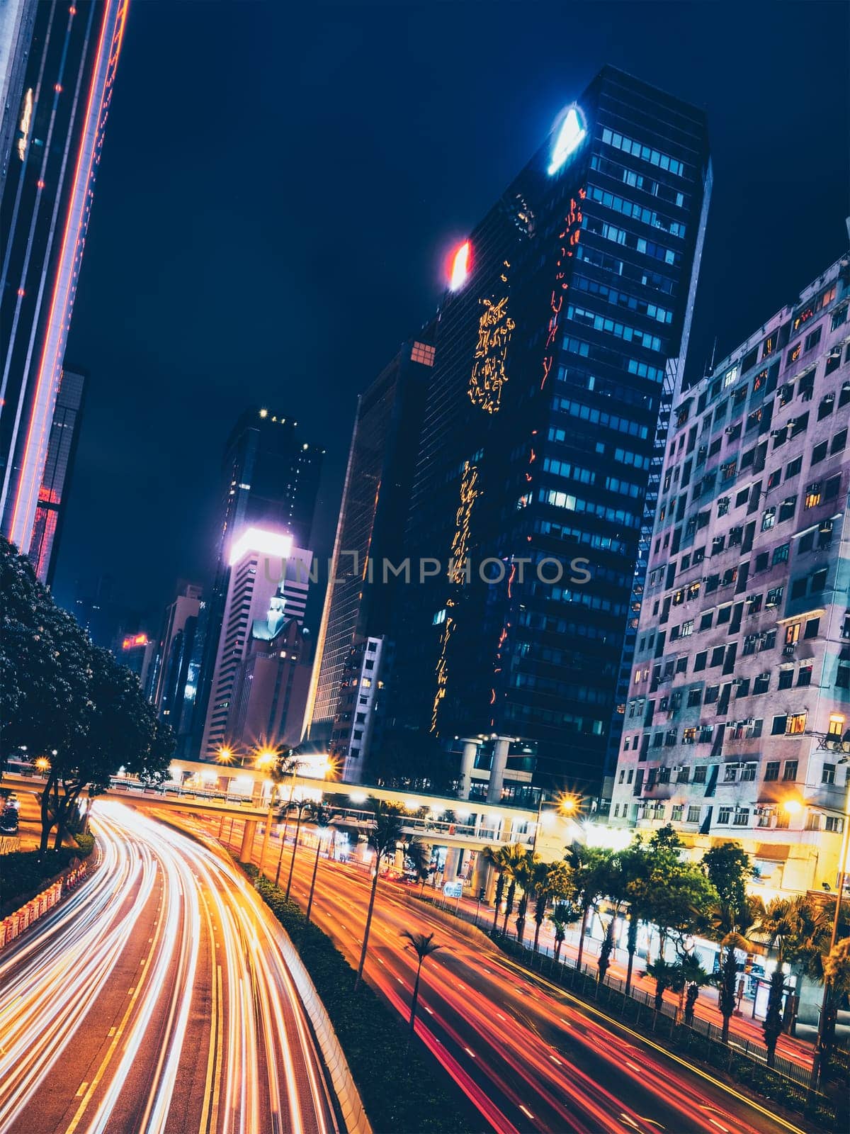 Street traffic in Hong Kong at night by dimol