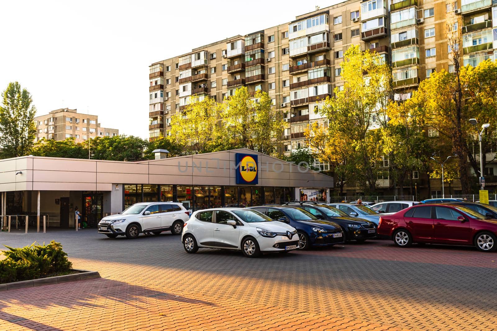 LIDL supermarket and logo. Lidl store in Bucharest, Romania, 2021 by vladispas