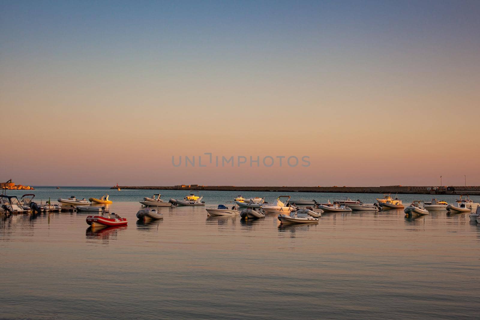 Boats in the Porto Empedocle sea by bepsimage