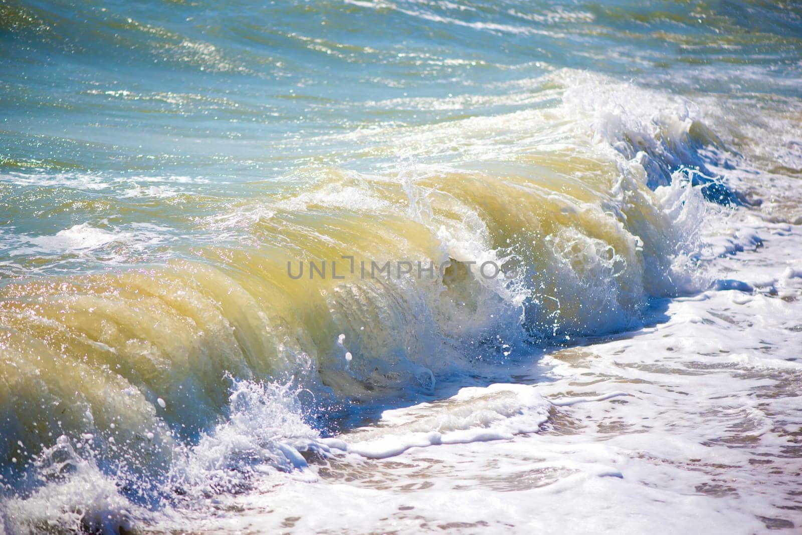 The sea is stormy. Sea of Azov. Water edge, sea, wave, storm - marine natural background. Birds seagulls on the sea coast, a beach by aprilphoto