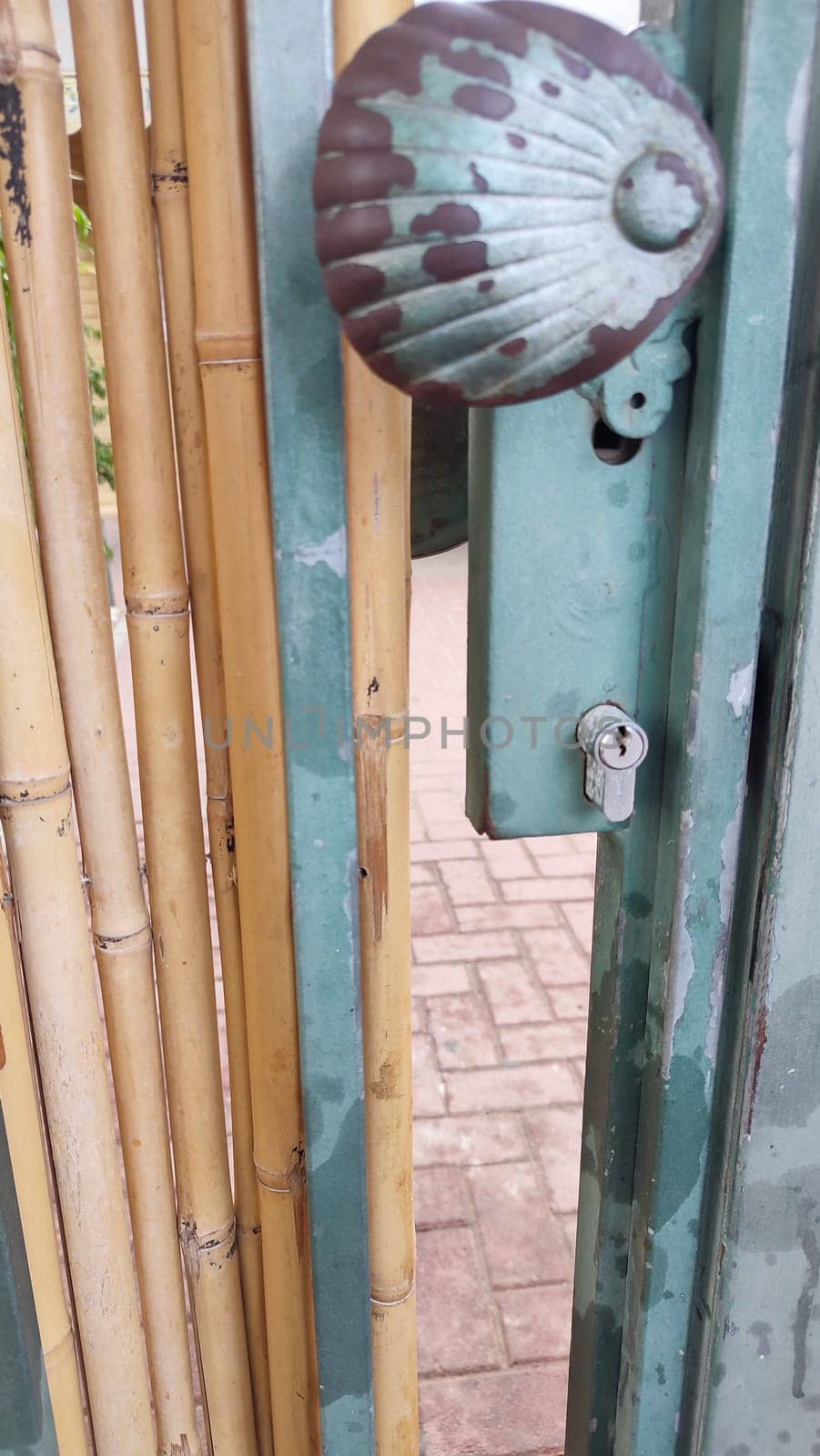 outdoor fence made of bamboo and metal, objects. High quality photo