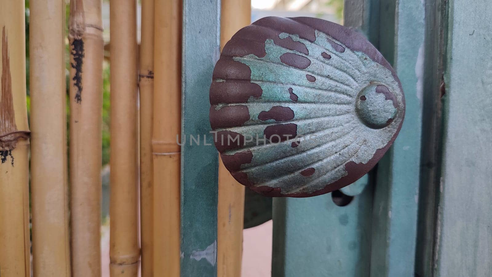 outdoor fence made of bamboo and metal, objects. High quality photo