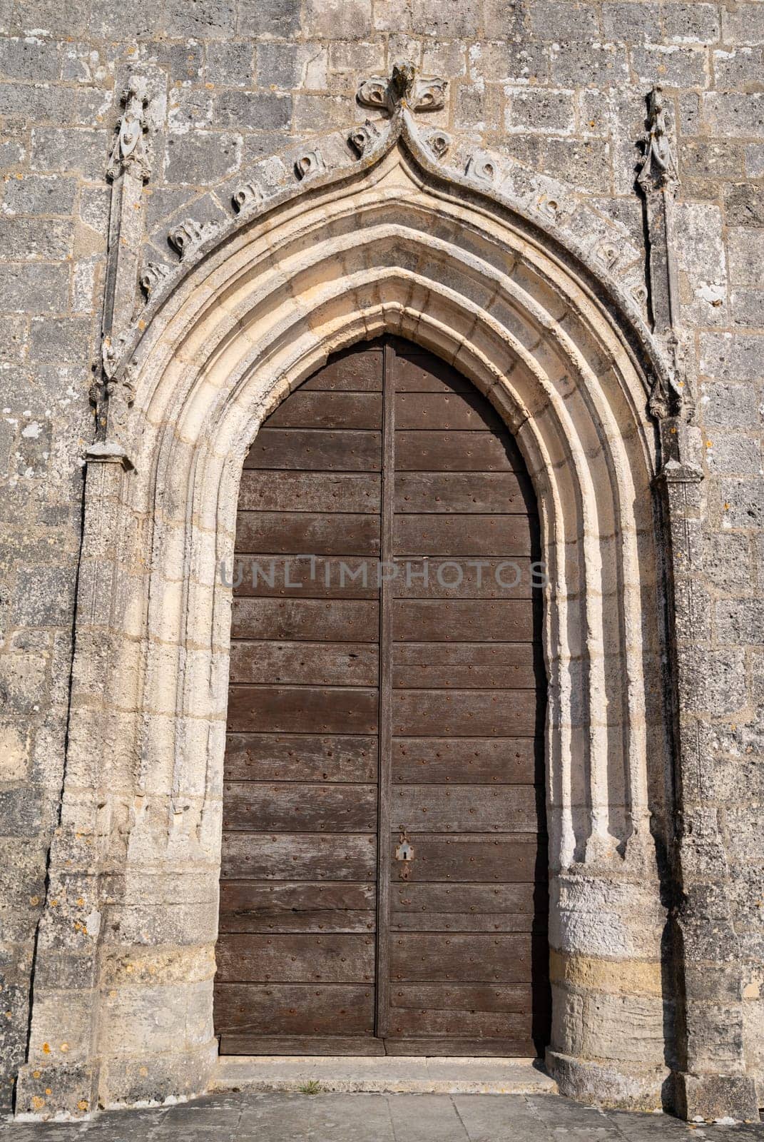Talmont sur gironde, View of the wood door of church Sainte Radegonde 12th century. High quality photo