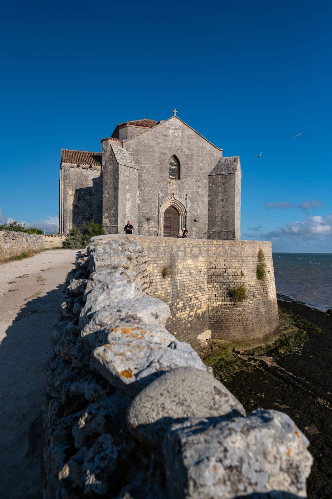 Talmont sur gironde, View of the church Sainte Radegonde 12th century. High quality photo