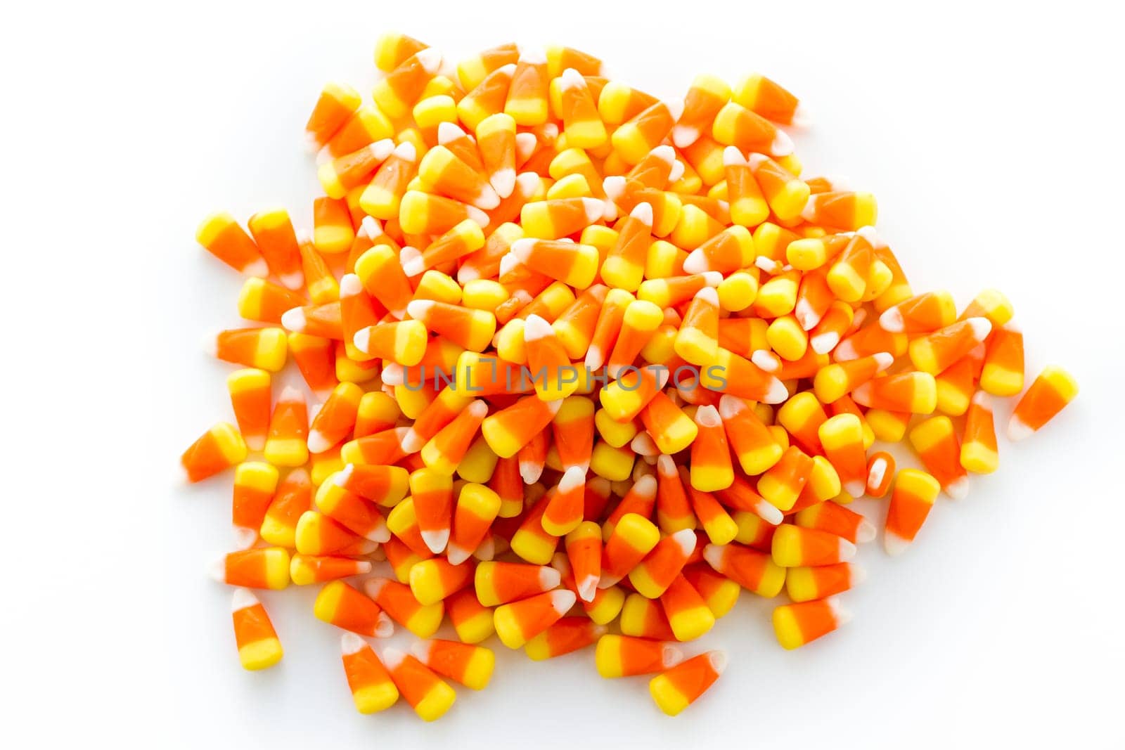 Halloween candy-corn on a white background.