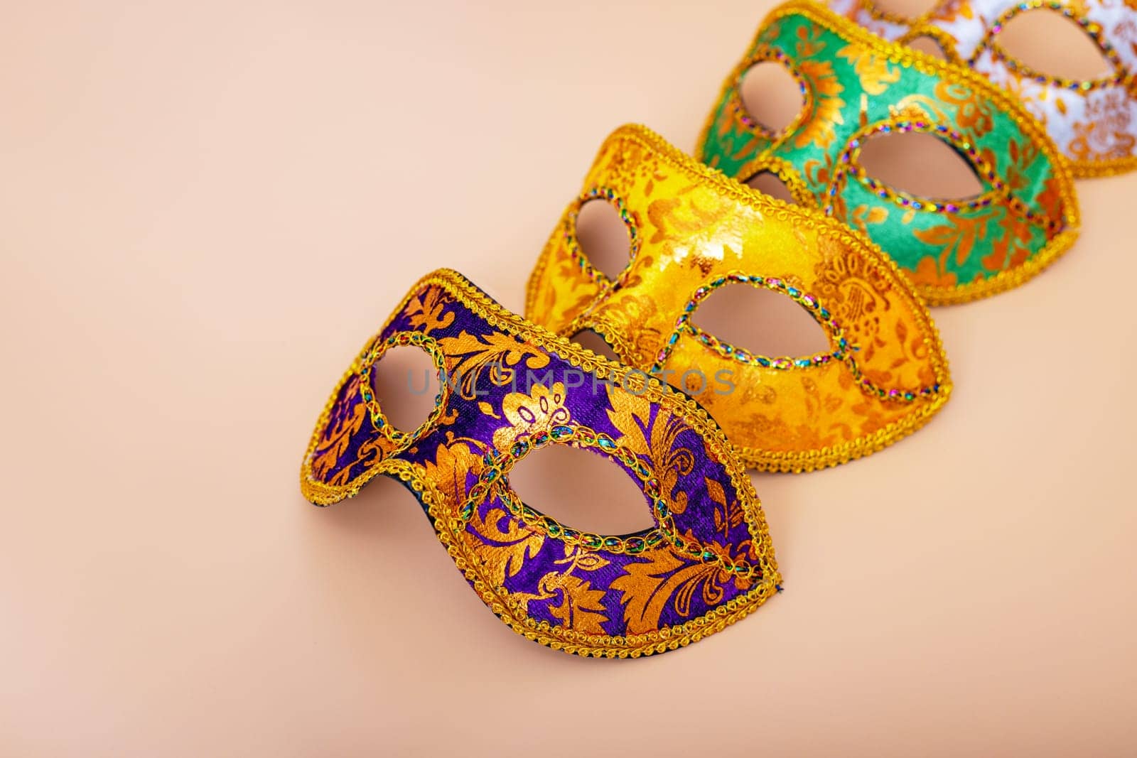 Carnival masks on color background. Purim celebration concept. jewish carnival holiday. Masquerade party or celebration concept.