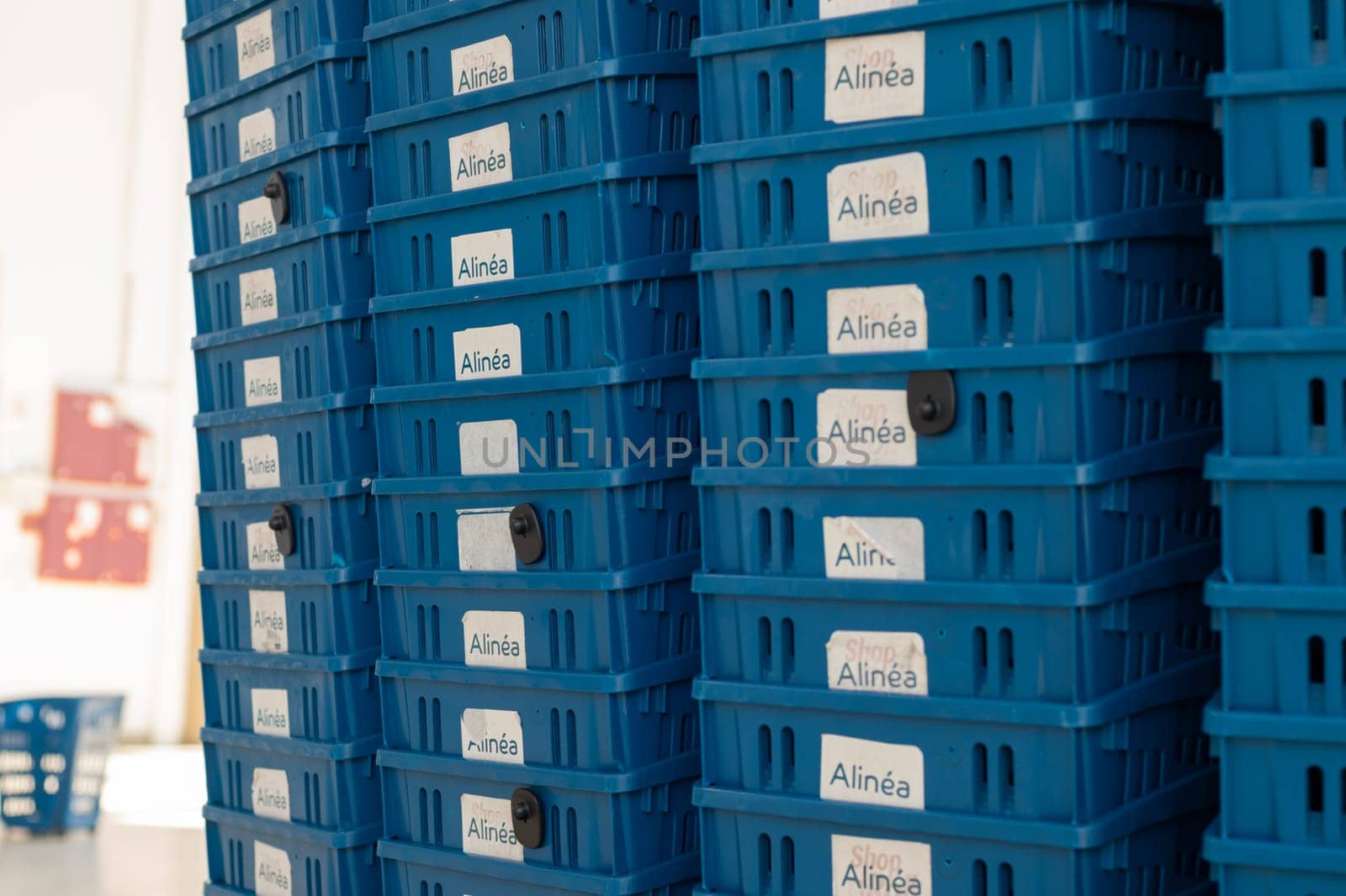ROUEN, FRANCE - MAY 20, 2020: Plastic empty trolley are in a row in the store ALINEA