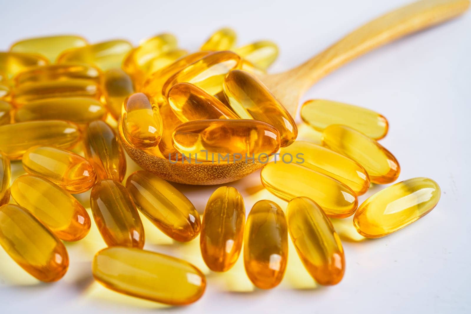 Fish oil Omega 3 capsules vitamin with EPA and DHA isolated on white background.