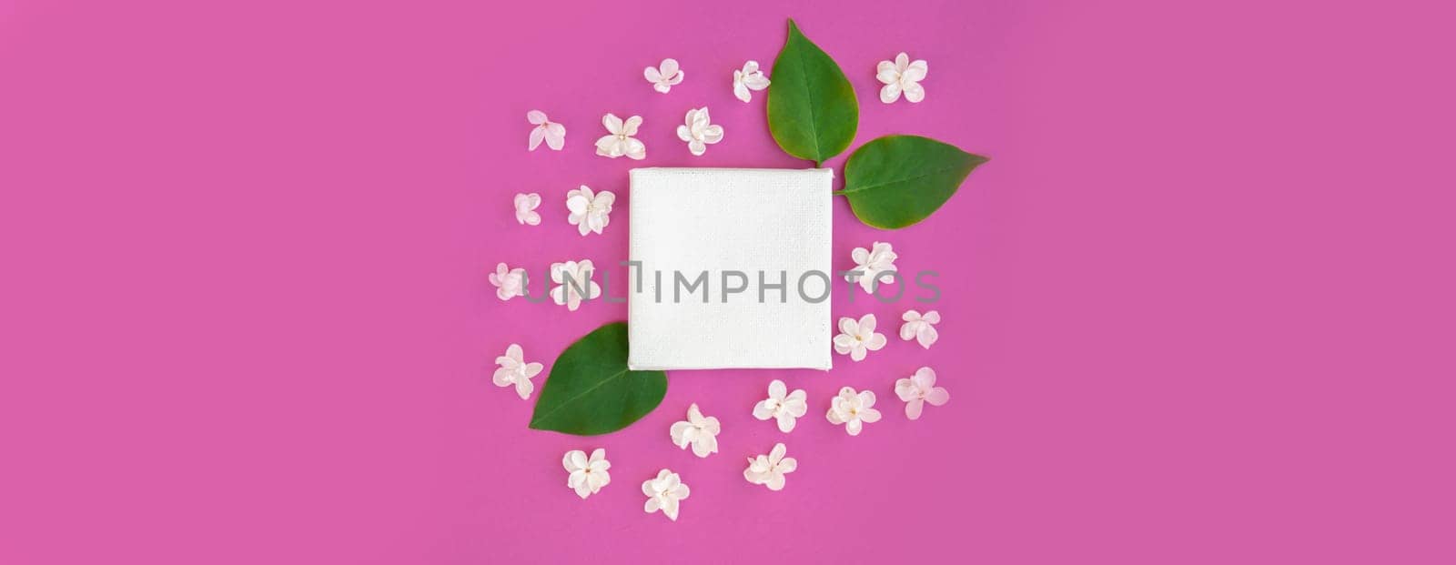 Composition frame made of beautiful spring lilac flowers. Mockup card invitation greeting card postcard copy space template blank. Branches of lilac blooming bouquet. Springtime