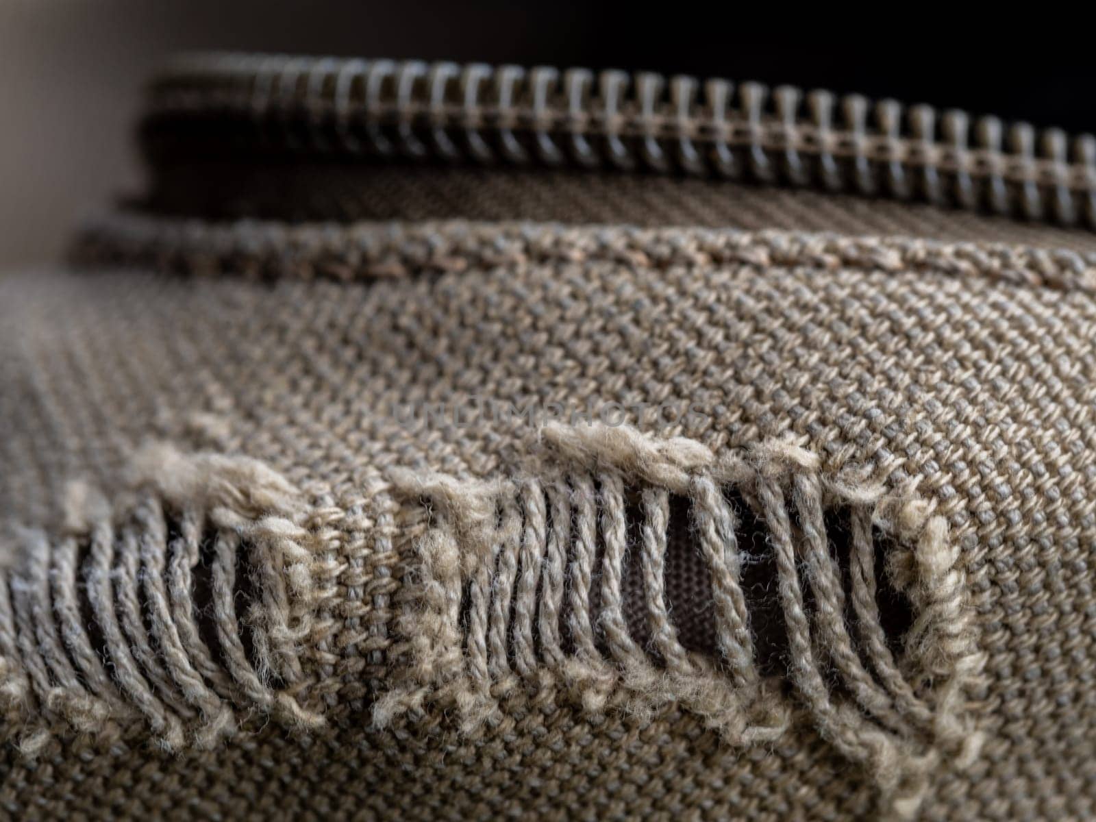 Close-up of an old cloth bag torn by Satakorn