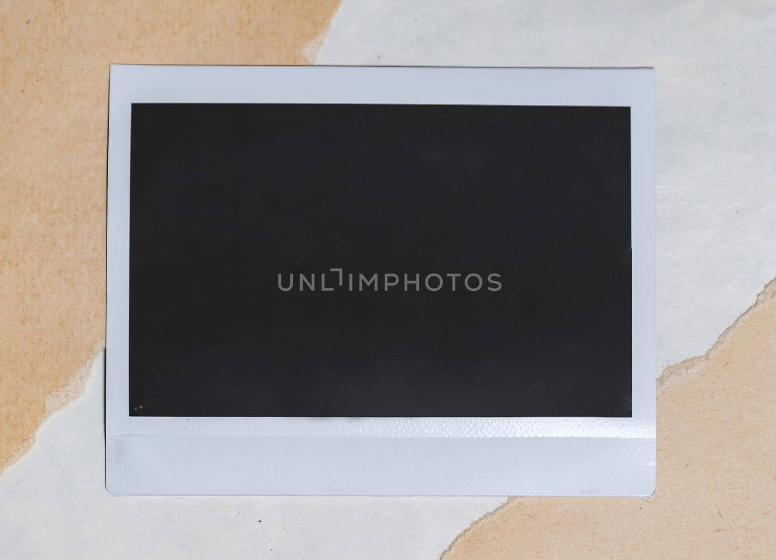 Blank photo frame on brown background as template for design. Photo card with space for your logo or text. by igor010