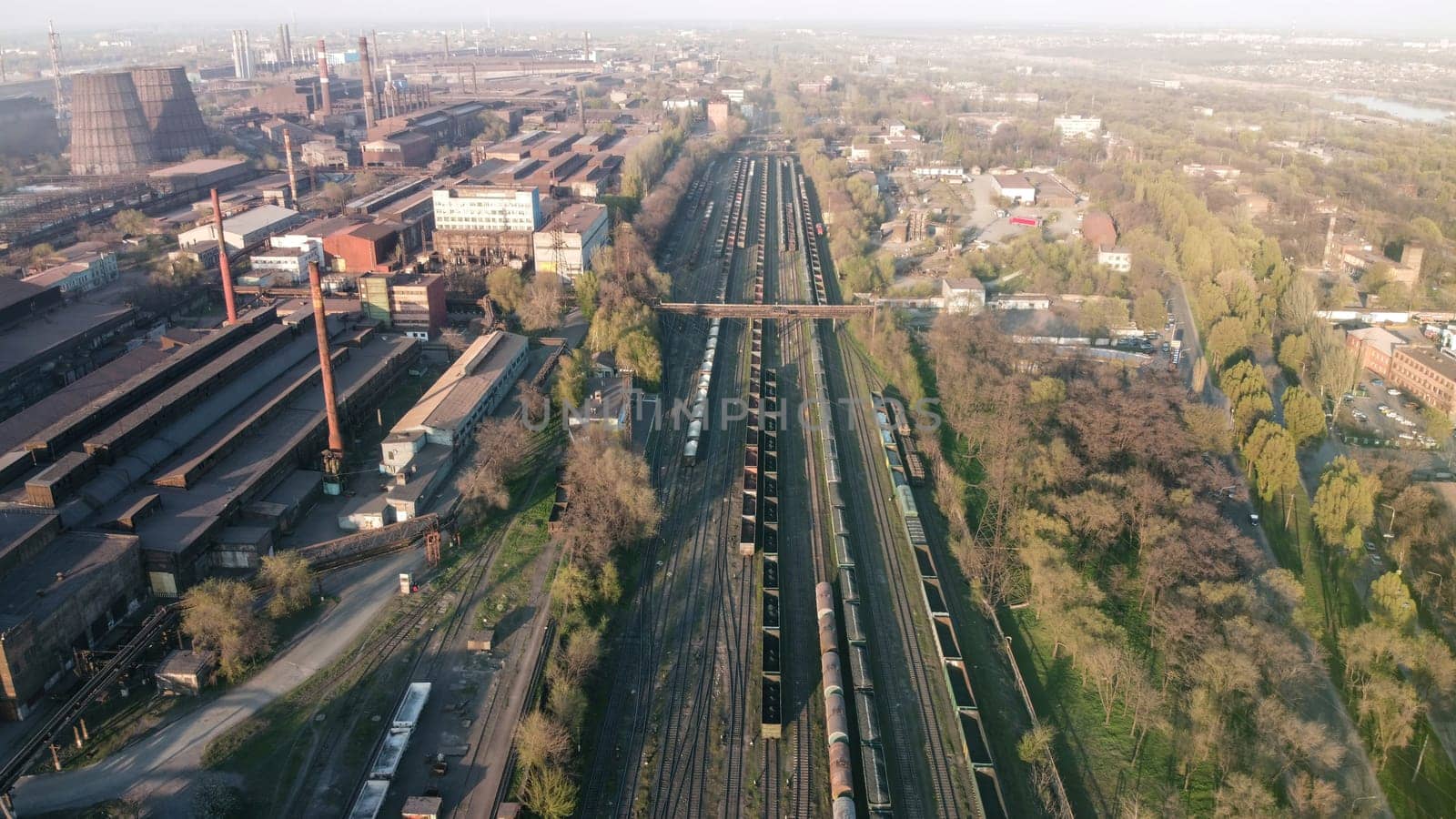 Aerial Top view to railway cylindrical tank shipping containers Rail. Striped creative transport industry representation. railroads and freight trains to transport cargo by igor010