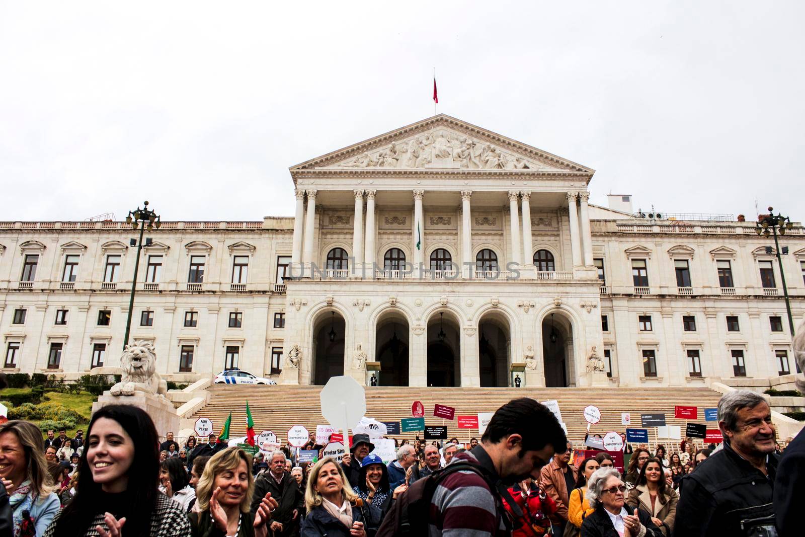 Lisbon, Portugal- May 24, 2018: Demonstrators protesting with placards against euthanasia and asking for palliative care at the doors of the Assembly of the Republic in Lisbon, Portugal