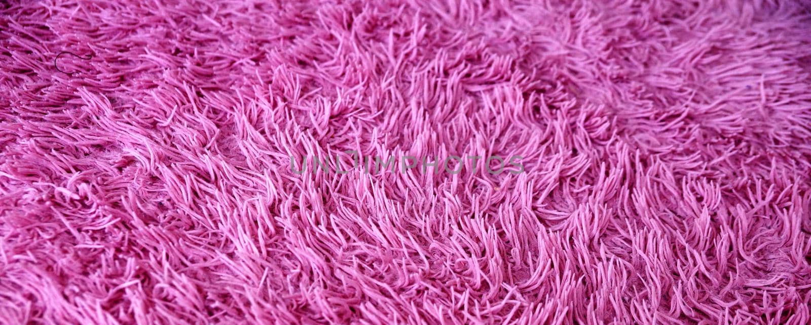 faux pink fur close-up for textile background