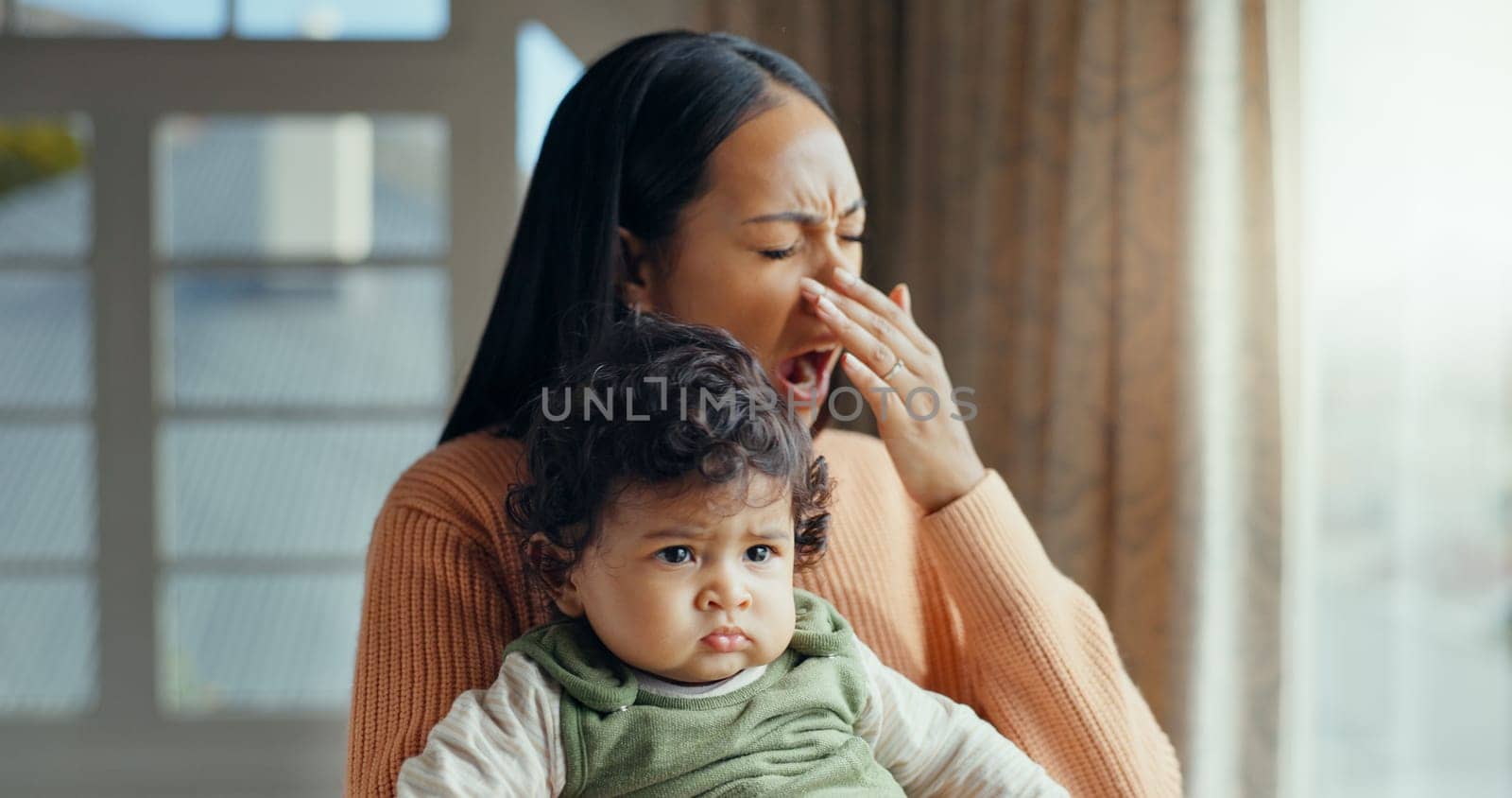 Family, yawn and tired mother with baby for bonding, quality time and relaxing together at home. New born, motherhood and exhausted mom carry young infant for care, support and affection in bedroom.