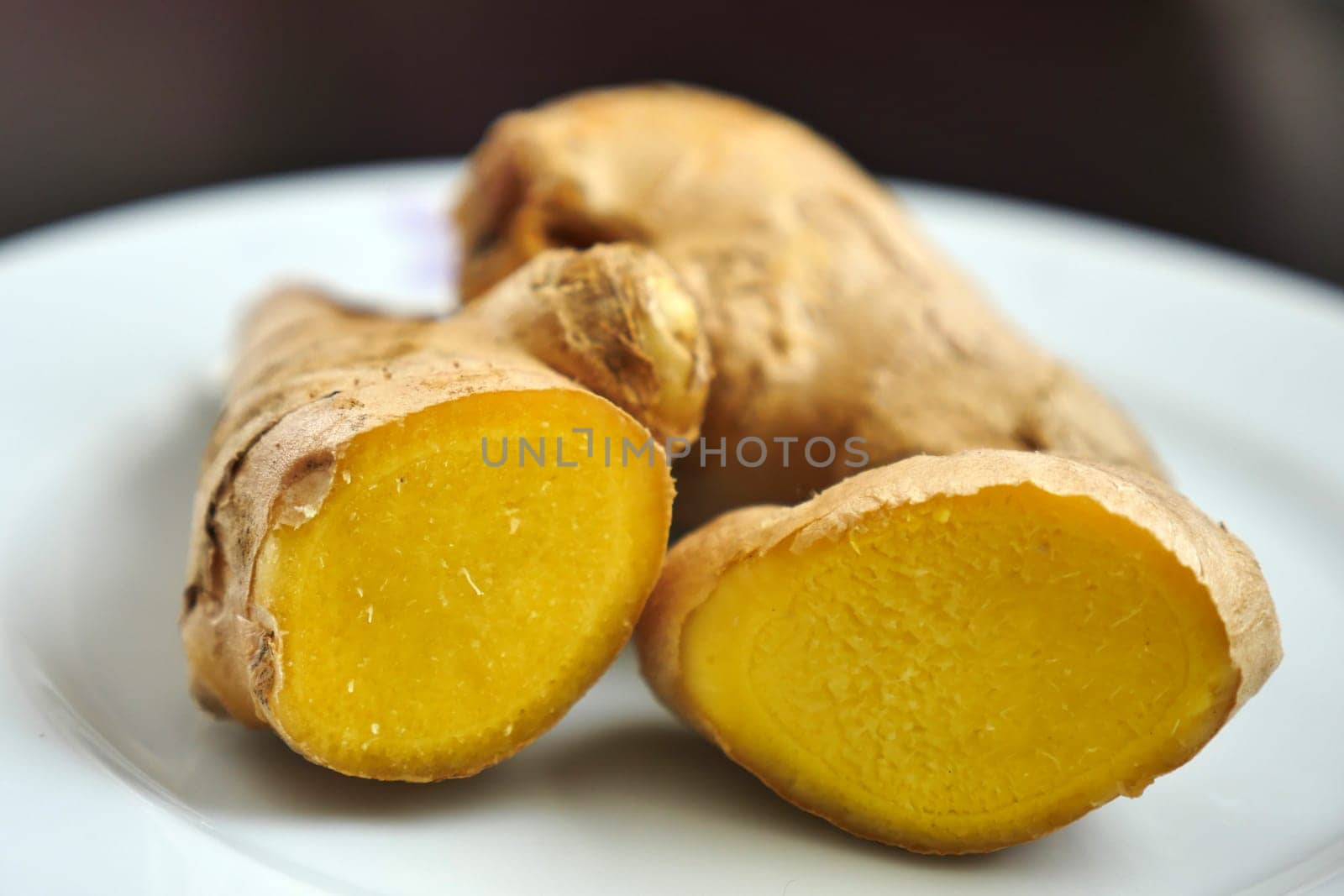 immune system and ginger tuber, fresh juicy ginger, by nhatipoglu