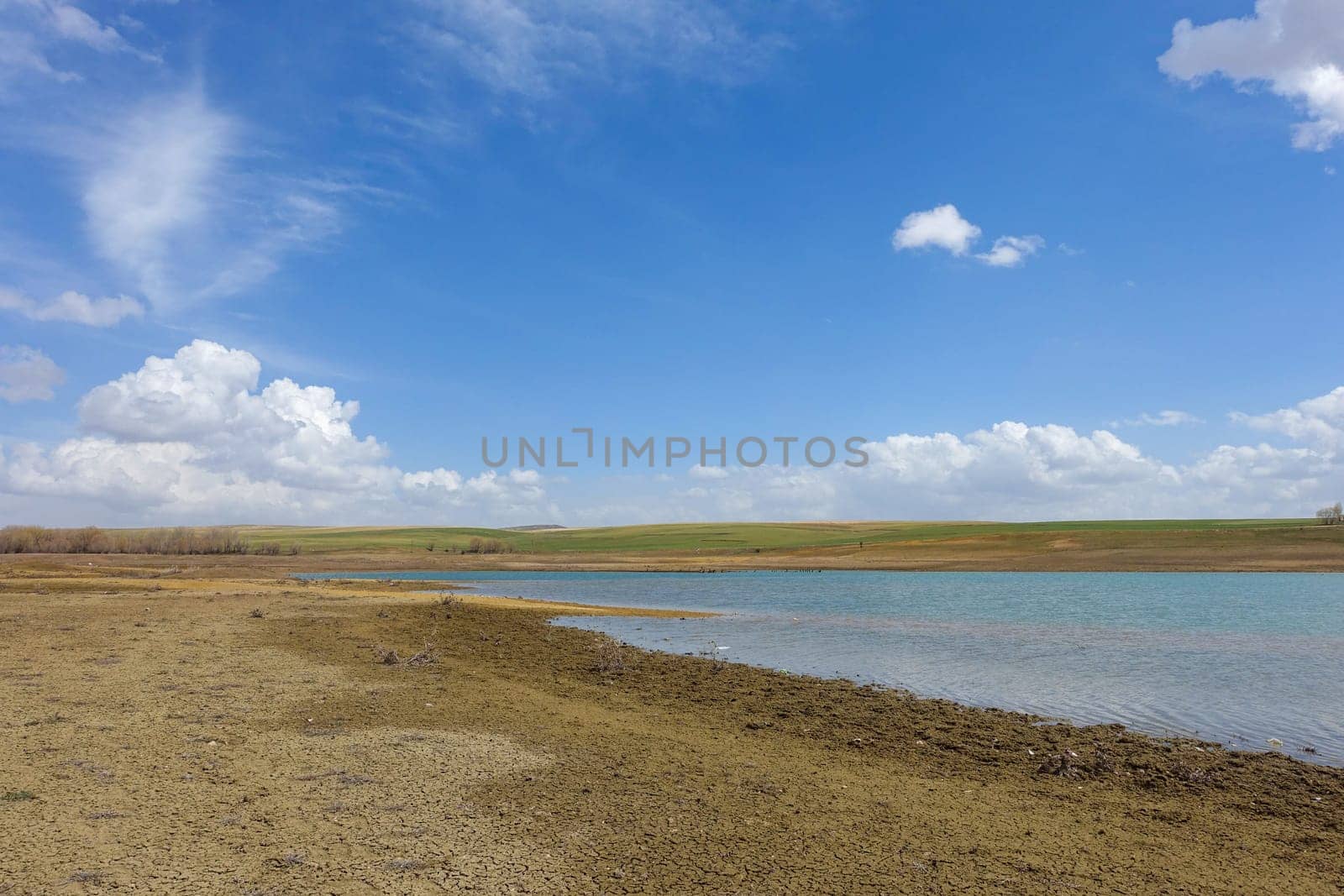 the arrival of spring and the awakening nature landscape-lake and clouds by nhatipoglu