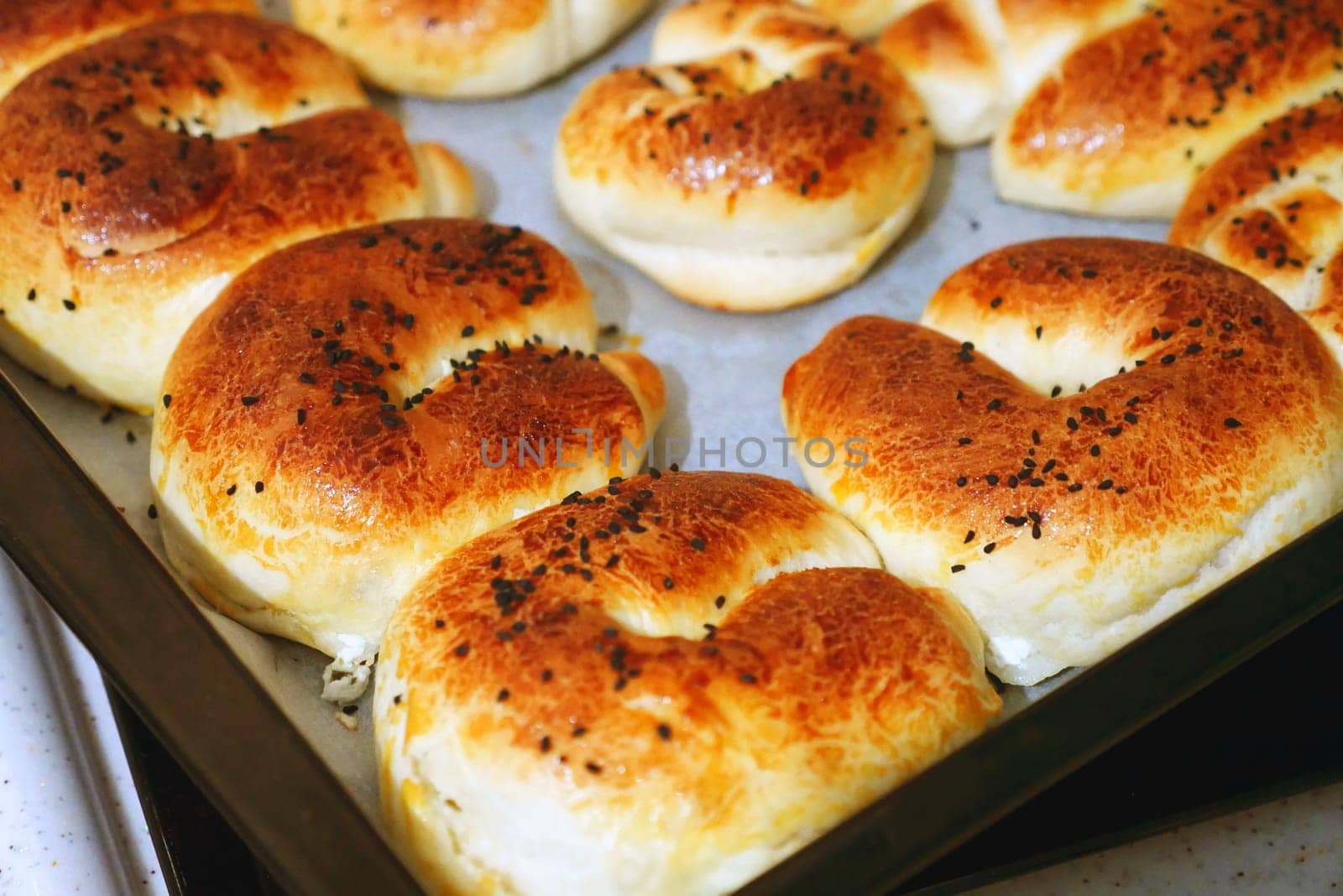 turkish style cheese pie, water pastry tray, serving börek, turkish style börek close-up, by nhatipoglu