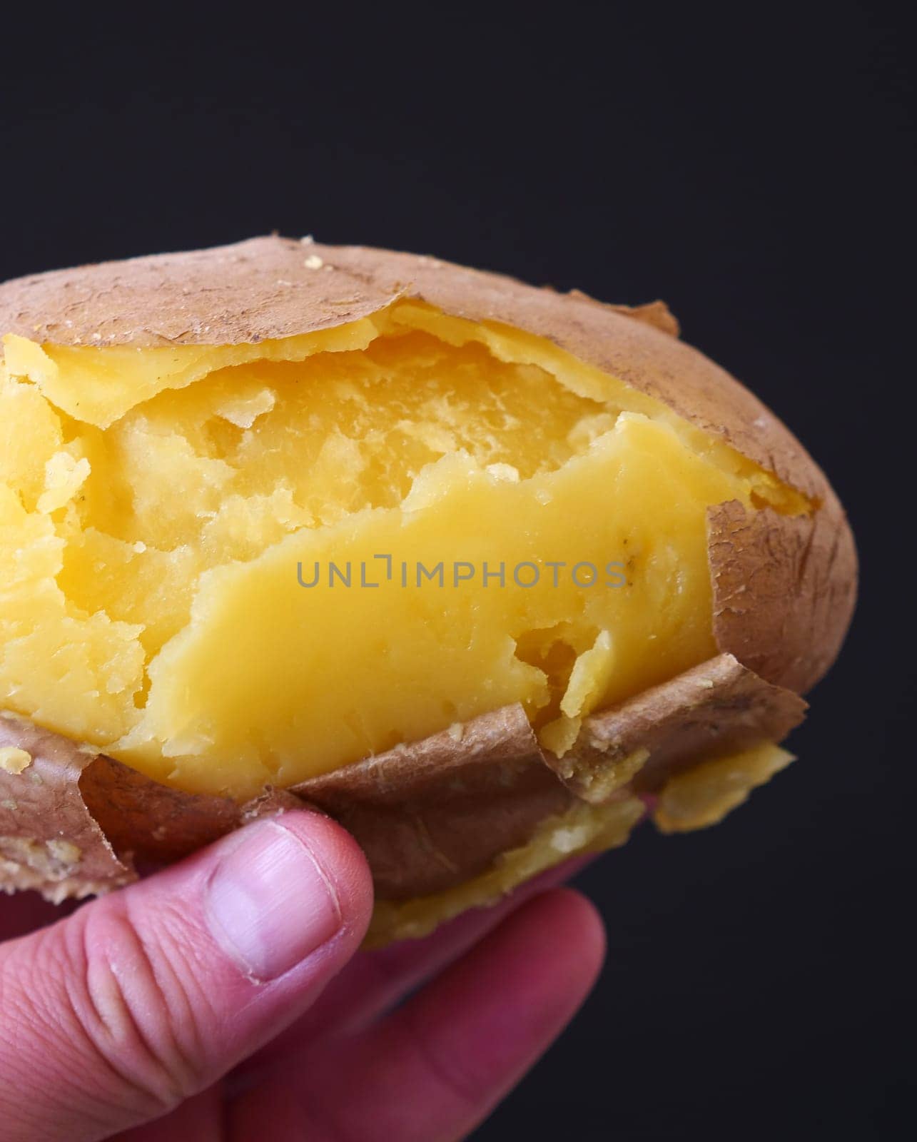 whole boiled potato, large boiled potato with skins,