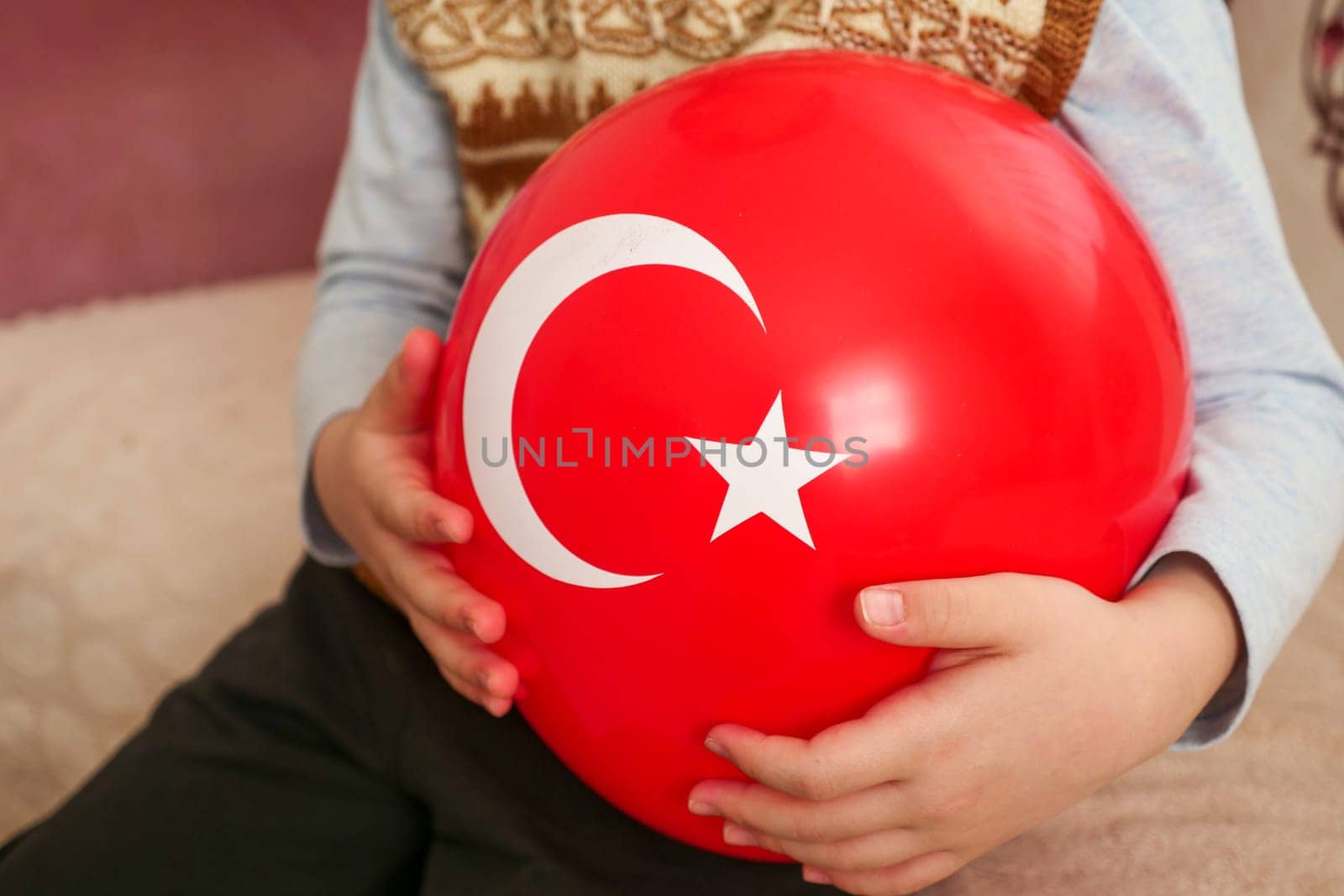 A balloon with a Turkish flag on it, a child holding a balloon with a Turkish flag, a patriotic Turkish child, by nhatipoglu