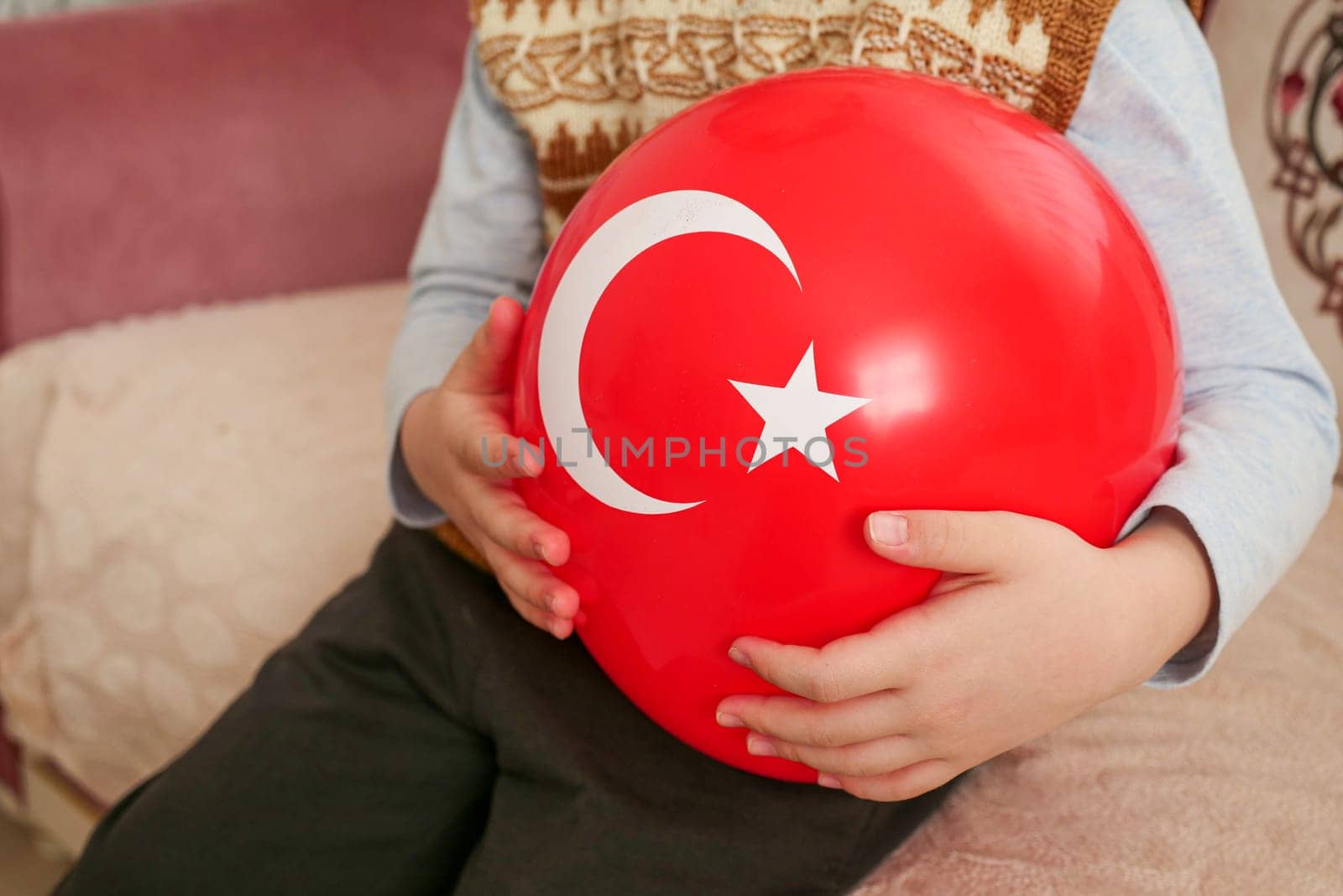 A balloon with a Turkish flag on it, a child holding a balloon with a Turkish flag, a patriotic Turkish child, by nhatipoglu