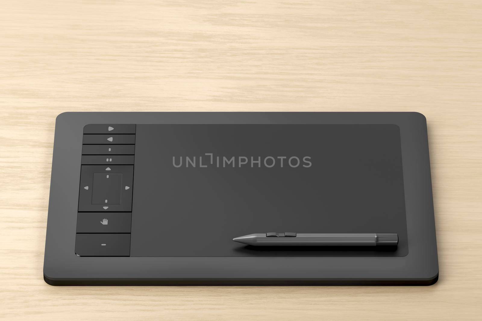 Graphics tablet with pen on wooden desk