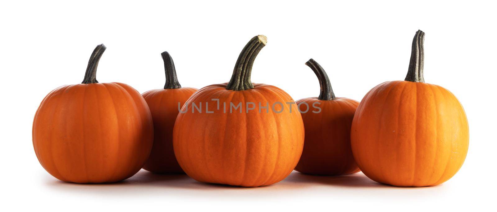 Orange pumpkins isolated on white by Yellowj
