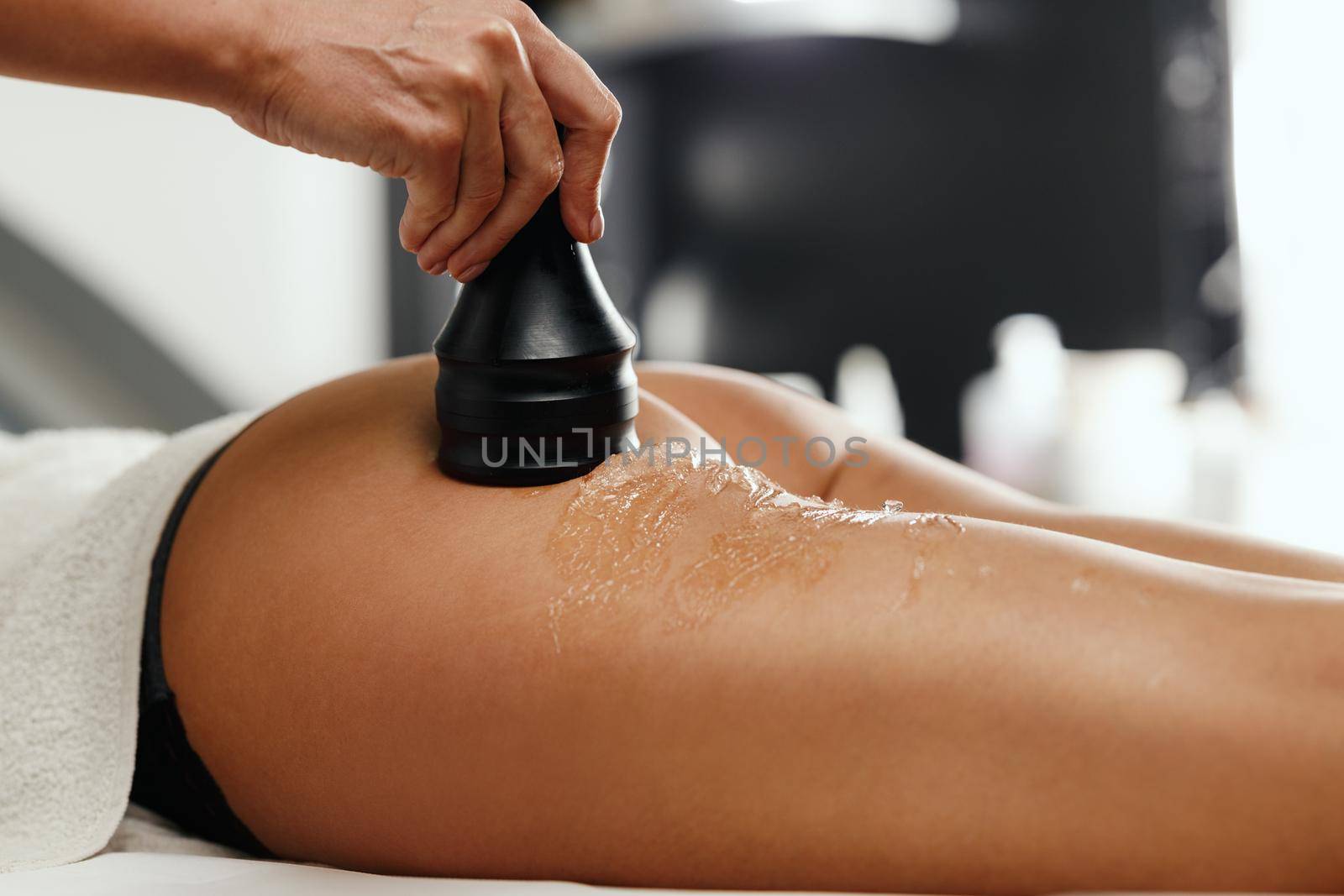Shot of a unrecognizable woman getting a anti cellulite massage at the beauty salon. She have a vacuum treatment to fat reduction.