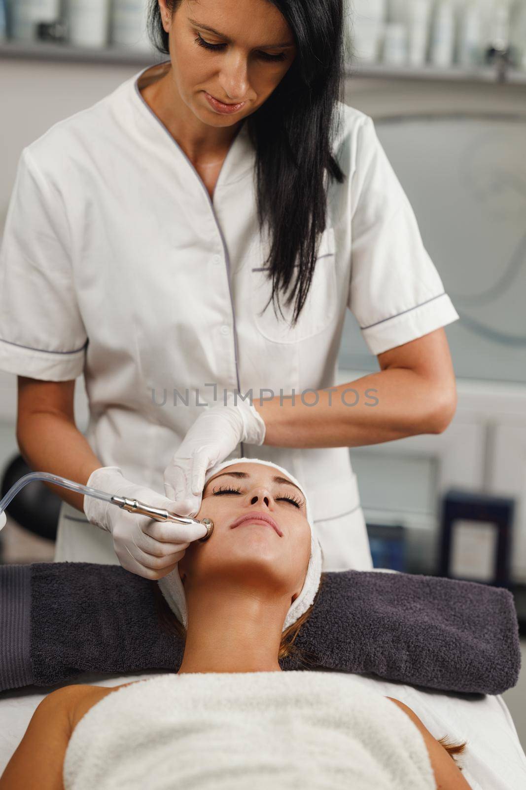 Microdermabrasion Treatment In A Beauty Salon by MilanMarkovic78