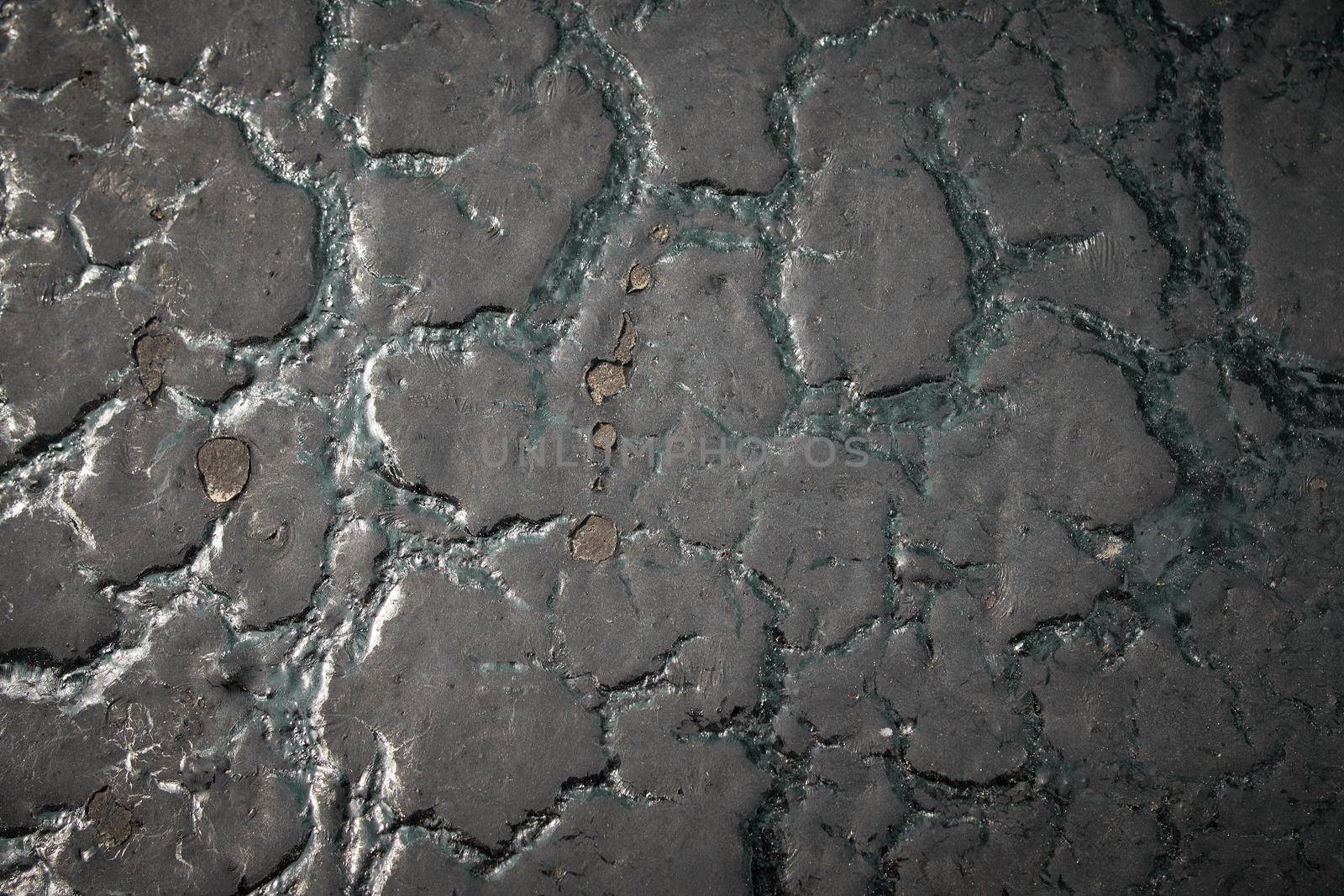 Grunge cracked texture. Black paint and structure pattern.Abstract texture