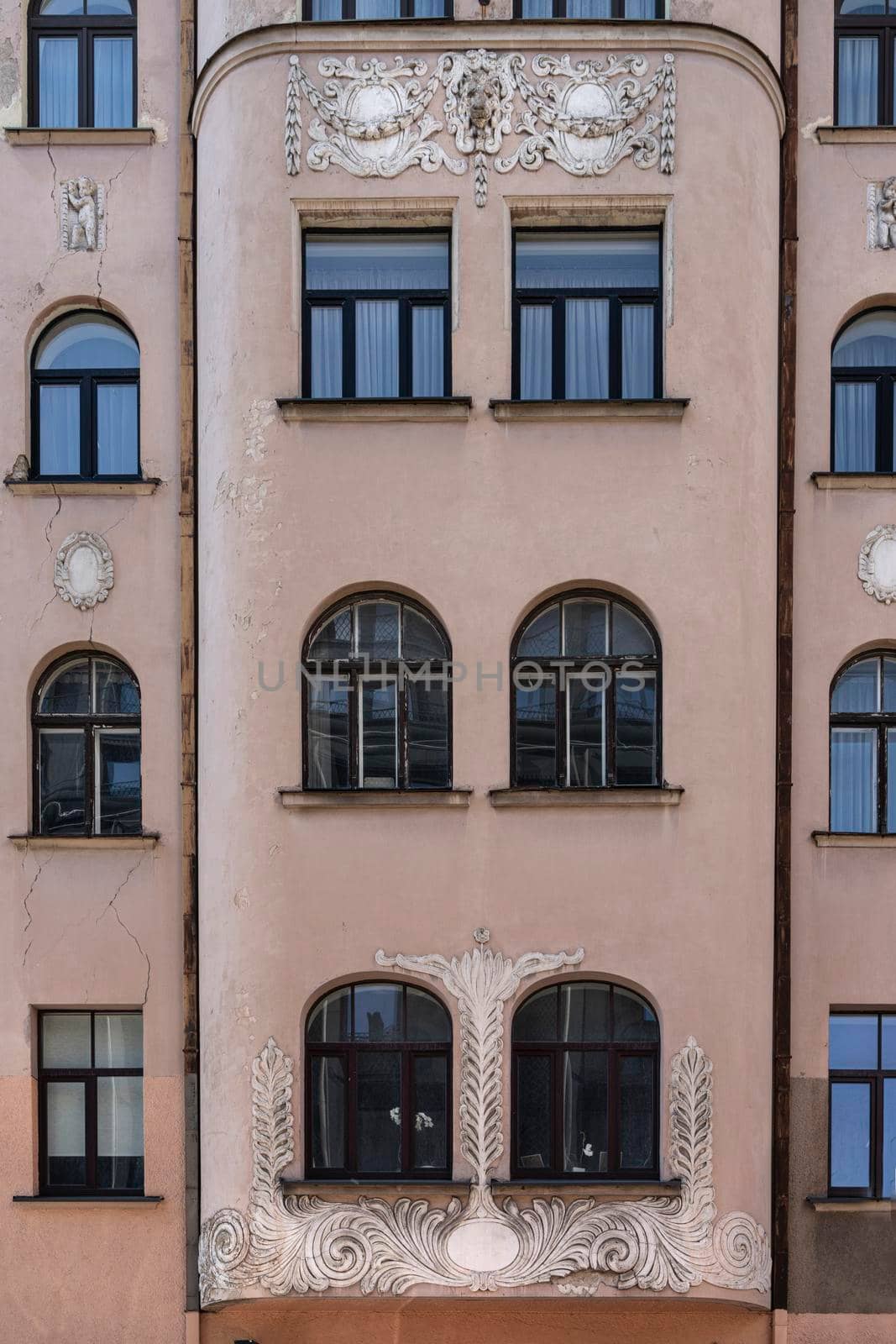 Riga, Latvia. August 2021.  view of the decorations on the facade of an old building in the city center
