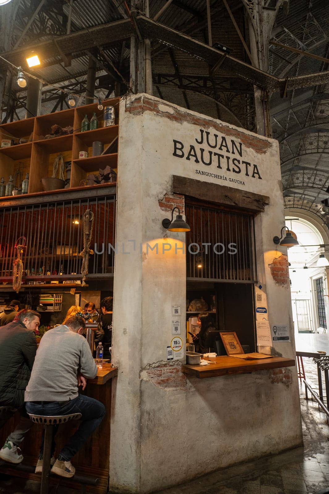 People eating at the San Telmo Market in Buenos Aires, the capital of Argentina in 2023. by martinscphoto