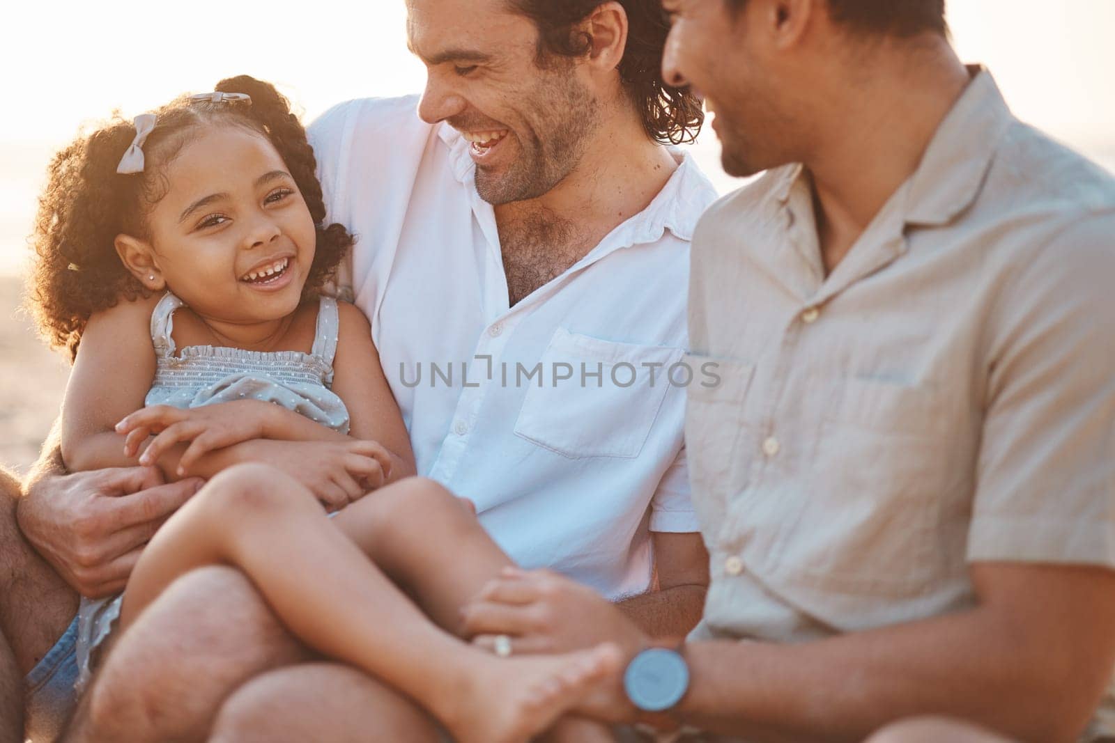 Gay couple, happy and relax with family at beach for seaside holiday, support and travel. Summer, vacation and love with men and child laughing in nature for lgbtq, happiness and bonding together by YuriArcurs