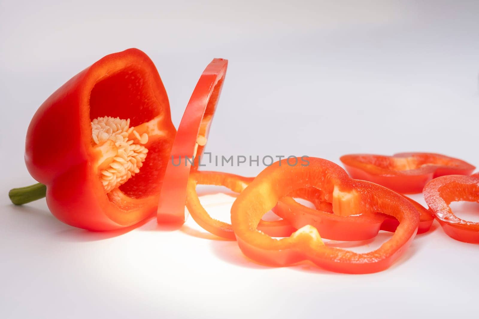 red bell pepper sliced on white background, red, cuisine, delicacy