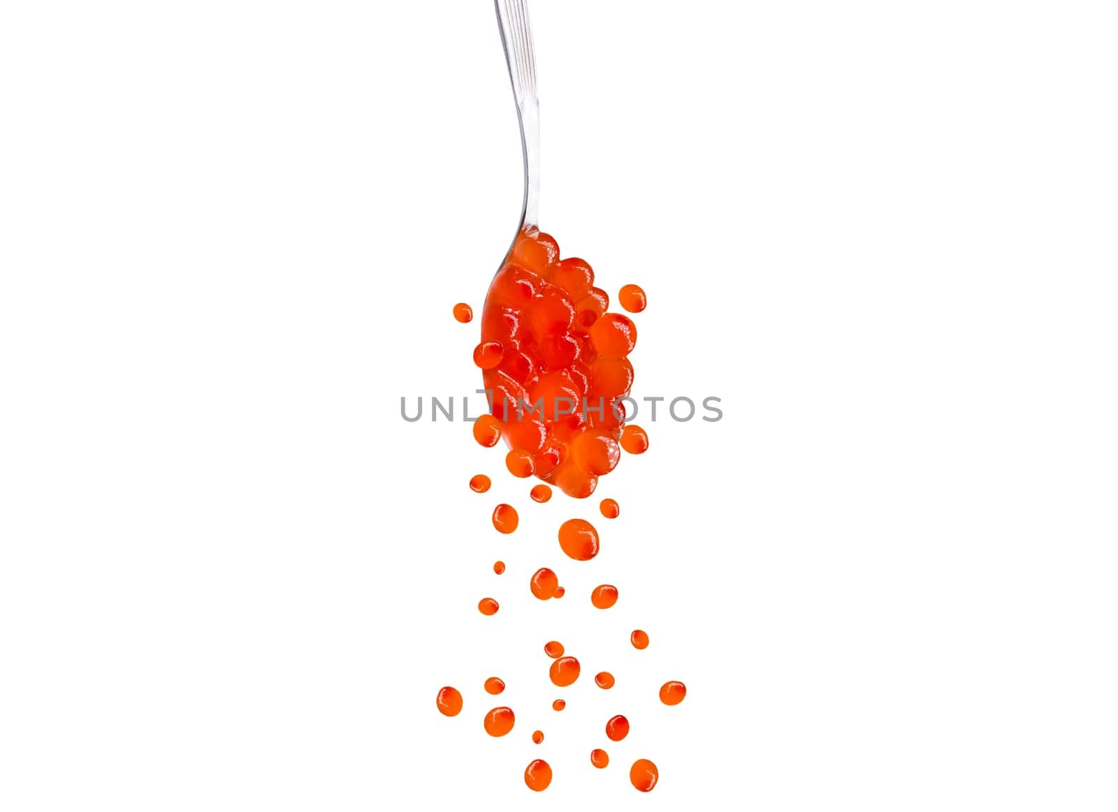 red fish caviar in a spoon and eggs falling down, isolated on white, red, cuisine, delicacy