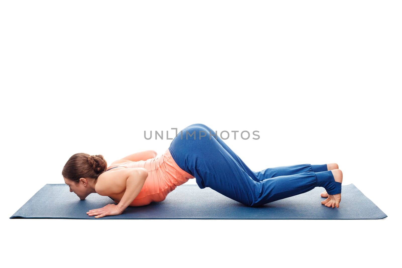Woman doing yoga asana Ashtangasana isolated on white by dimol
