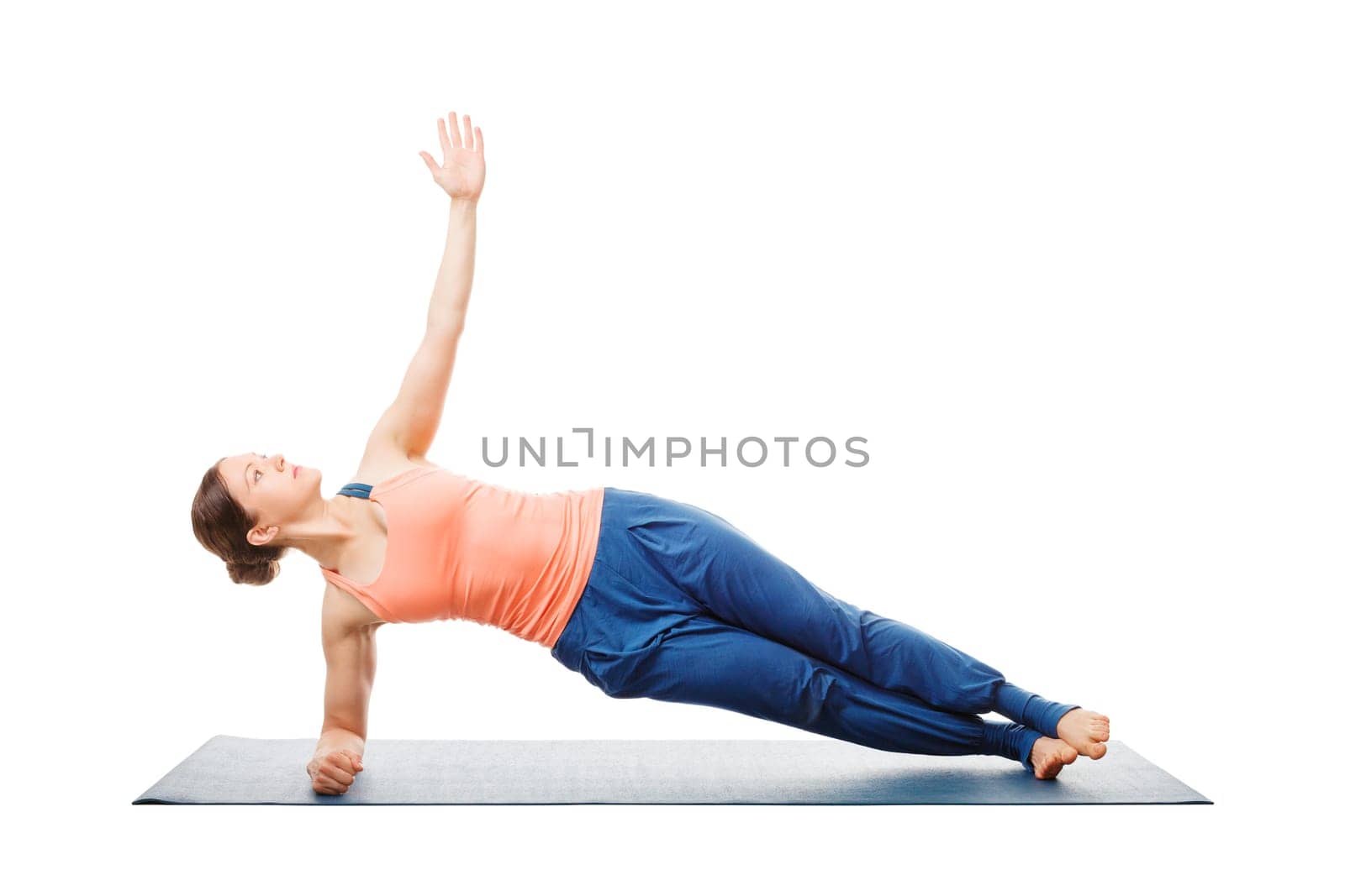 Hatha yoga - sporty fit woman doing yoga asana Vasisthasana - side plank pose modification for wrists isolated on white background