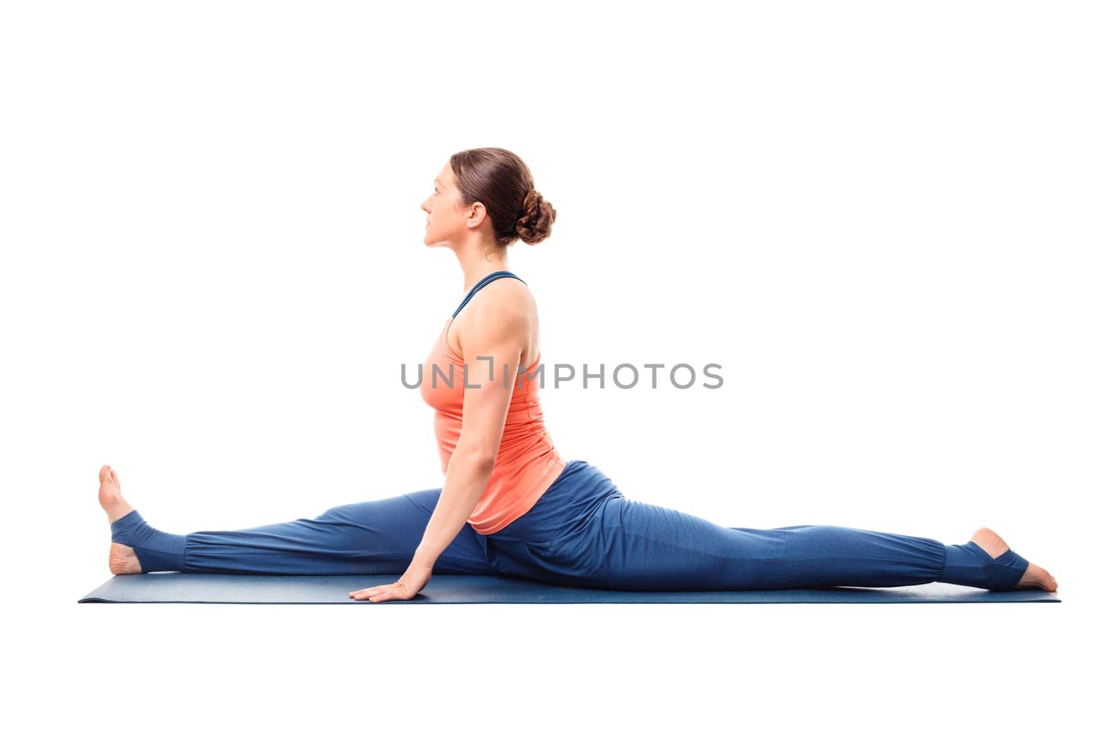 Woman doing Hatha Yoga asana Hanumanasana - monkey pose posture (splits) isolated on white background