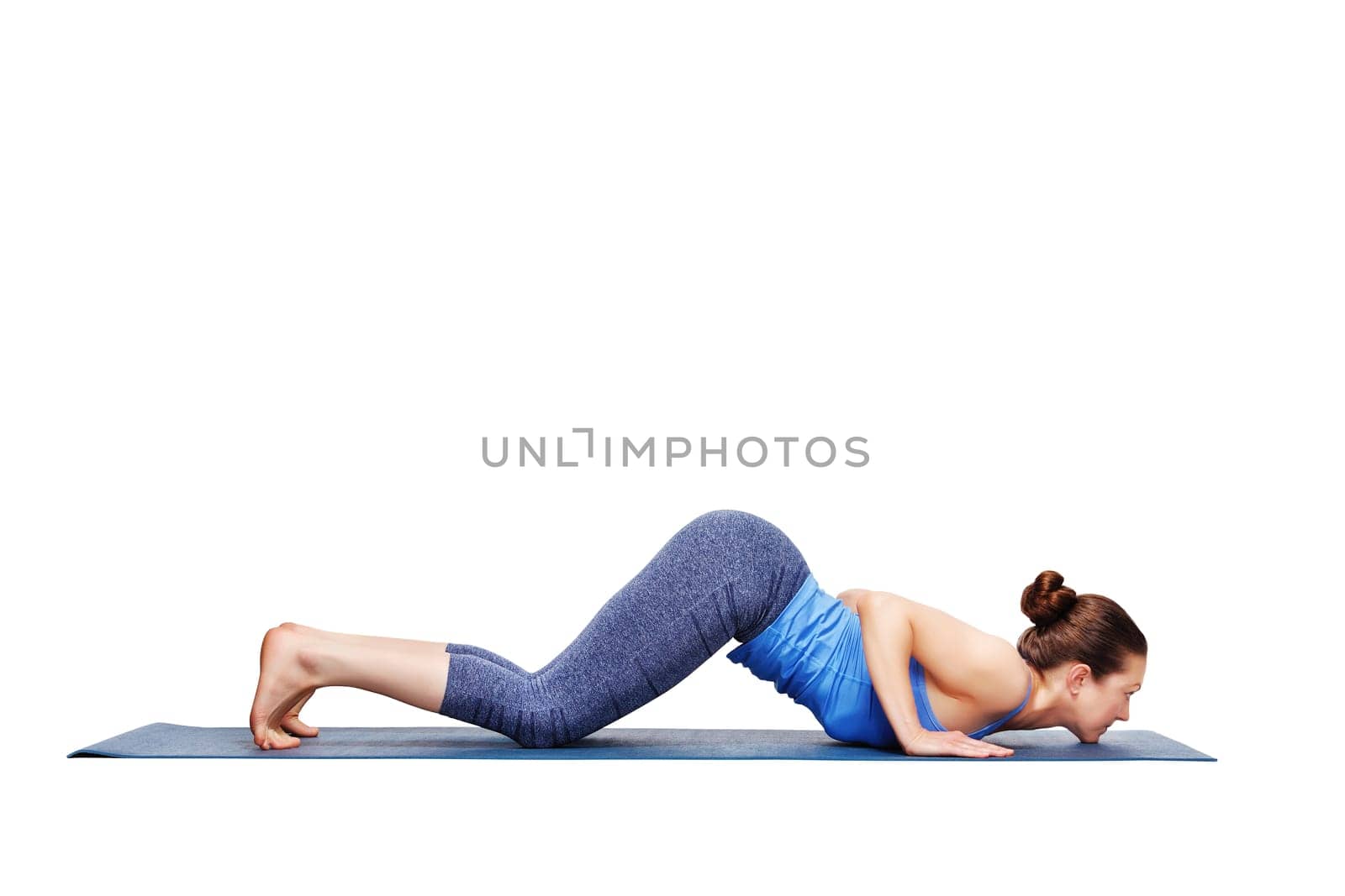 Sporty fit woman practices yoga asana Ashtangasana by dimol