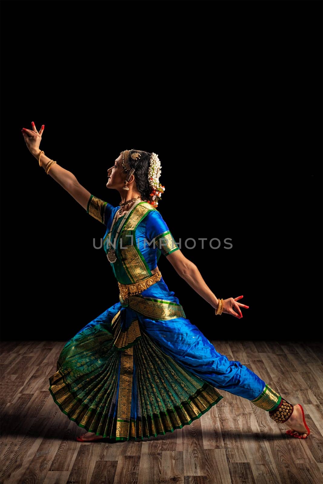 Beautiful woman dancer of Indian classical dance Bharatanatyam by dimol