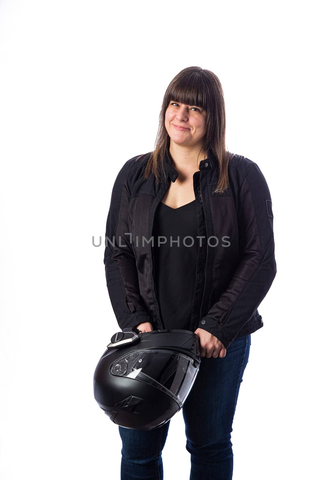 Forty year old woman, wearing motocycle clothing isolated on a white background