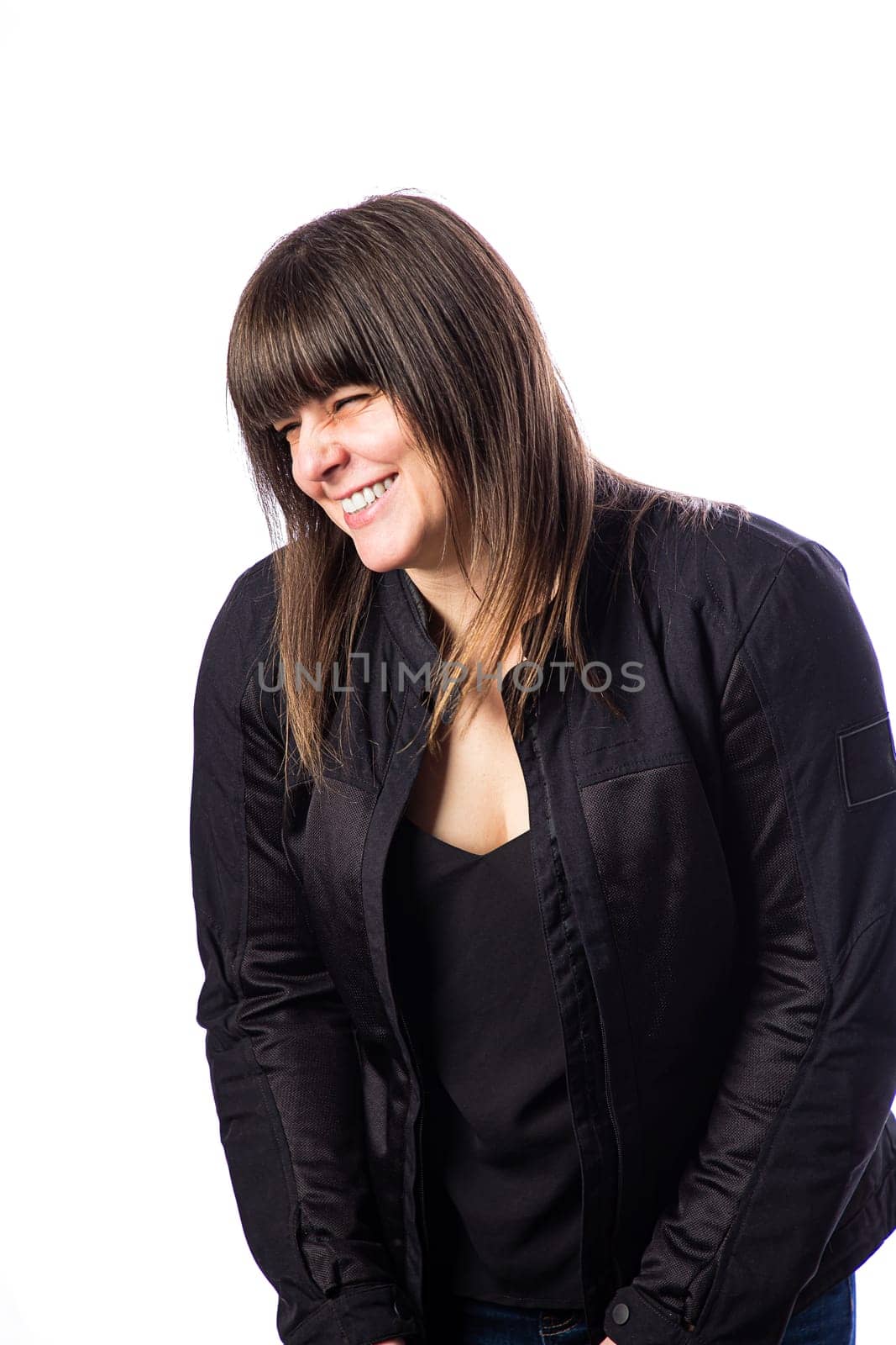 Happy woman in motocycle coat by mypstudio