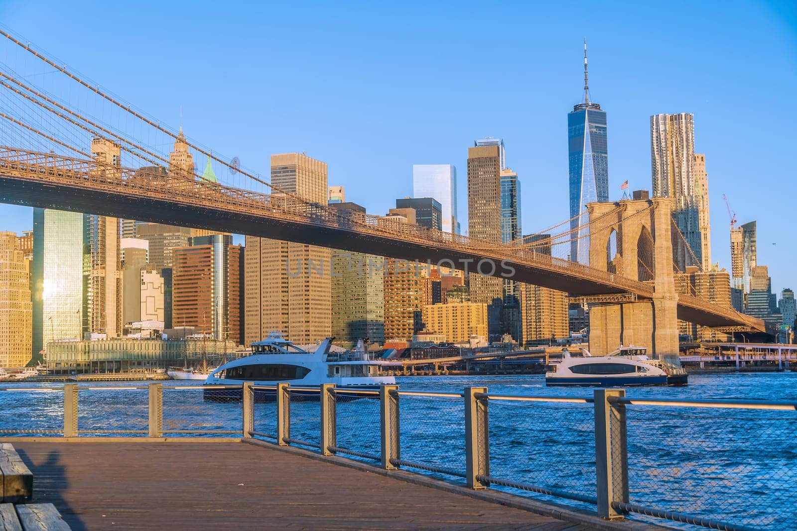 Manhattan's skyline with Brooklyn bridge, cityscape of New York City in the United States by f11photo